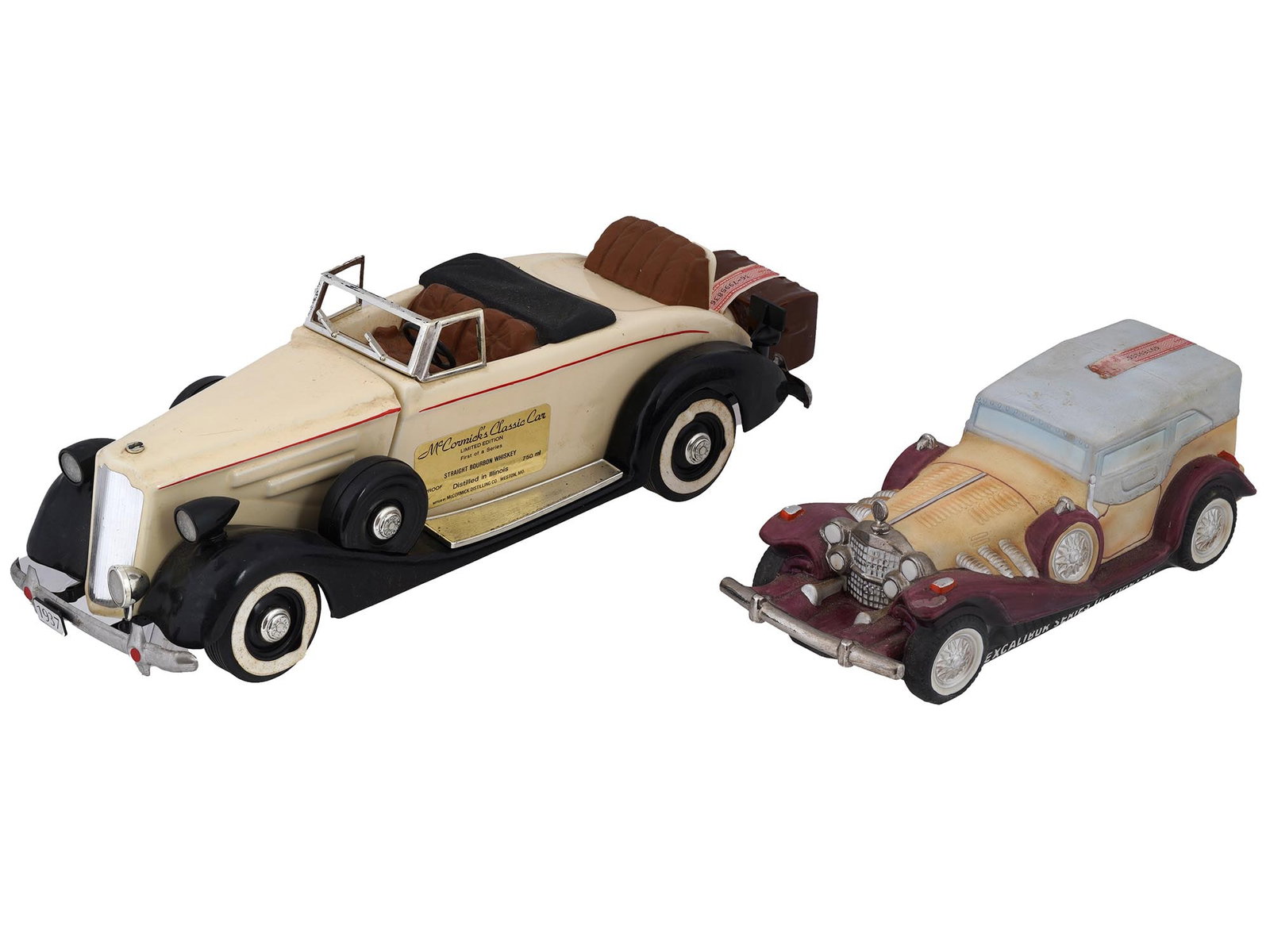 MCCORMICK DOUBLE SPRINGS PORCELAIN LIQUOR BOTTLES: A pair of vintage liquor bottles, figurative hand-painted porcelain. First. McCormick Straight Bourbon Whiskey, Limited Edition, Classic Car, First of the series. Second. Double Springs, Rare Old Coll