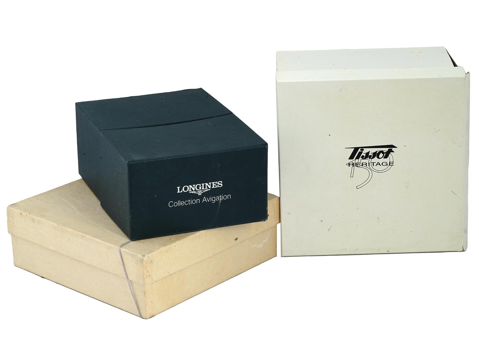 WATCH BOXES LONGINES AVIGATION EVIDENZA TISSOT HERITAGE: A group of three watch boxes, crafted from natural materials and representing esteemed brands and collections, such as Longines Collection Avigation, Tissot Heritage, and Longines Evidenza. Some boxes