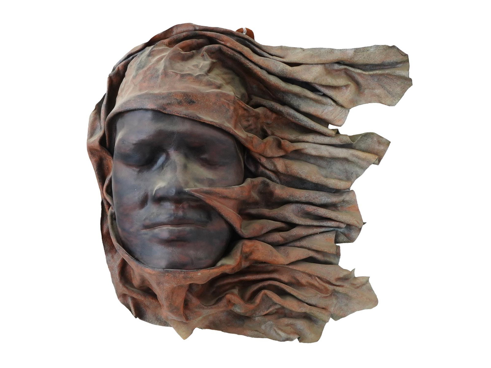 MODERN LEATHER SCULPTURE DESIGNED AS A FACE MASK: A modern sculpture crafted from leather, featuring a face mask, designed with expressive details. Signed by the artist and dated 1988. Modern Leather Sculptures And Faces Masks For Collectors. THIS LO