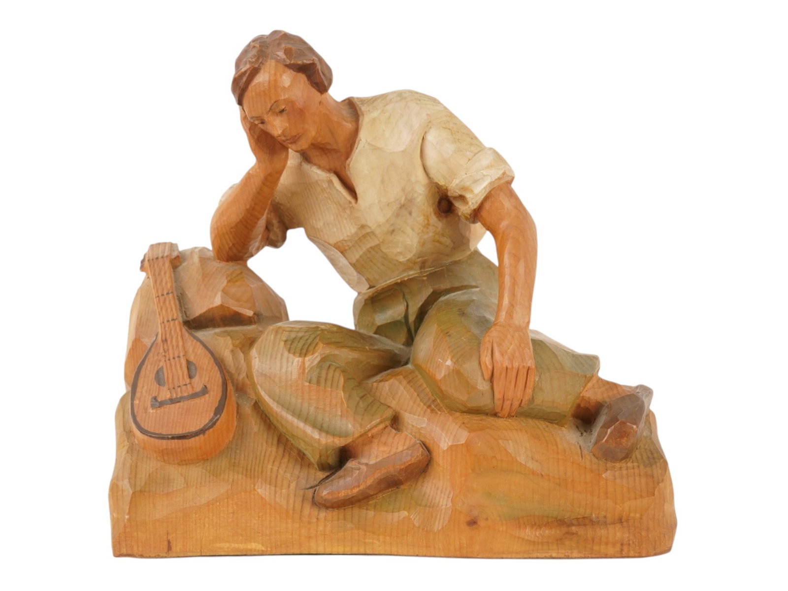 VINTAGE ITALIAN ANRI HAND CARVED WOODEN SCULPTURE: A vintage Italian hand-carved and painted wooden sculpture. Inscribed ANRI WOODCARVINGS on the paper label on the bottom. Founded in 1912 by Anton Riffeser in South Tyrol, Italy, ANRI transformed trad