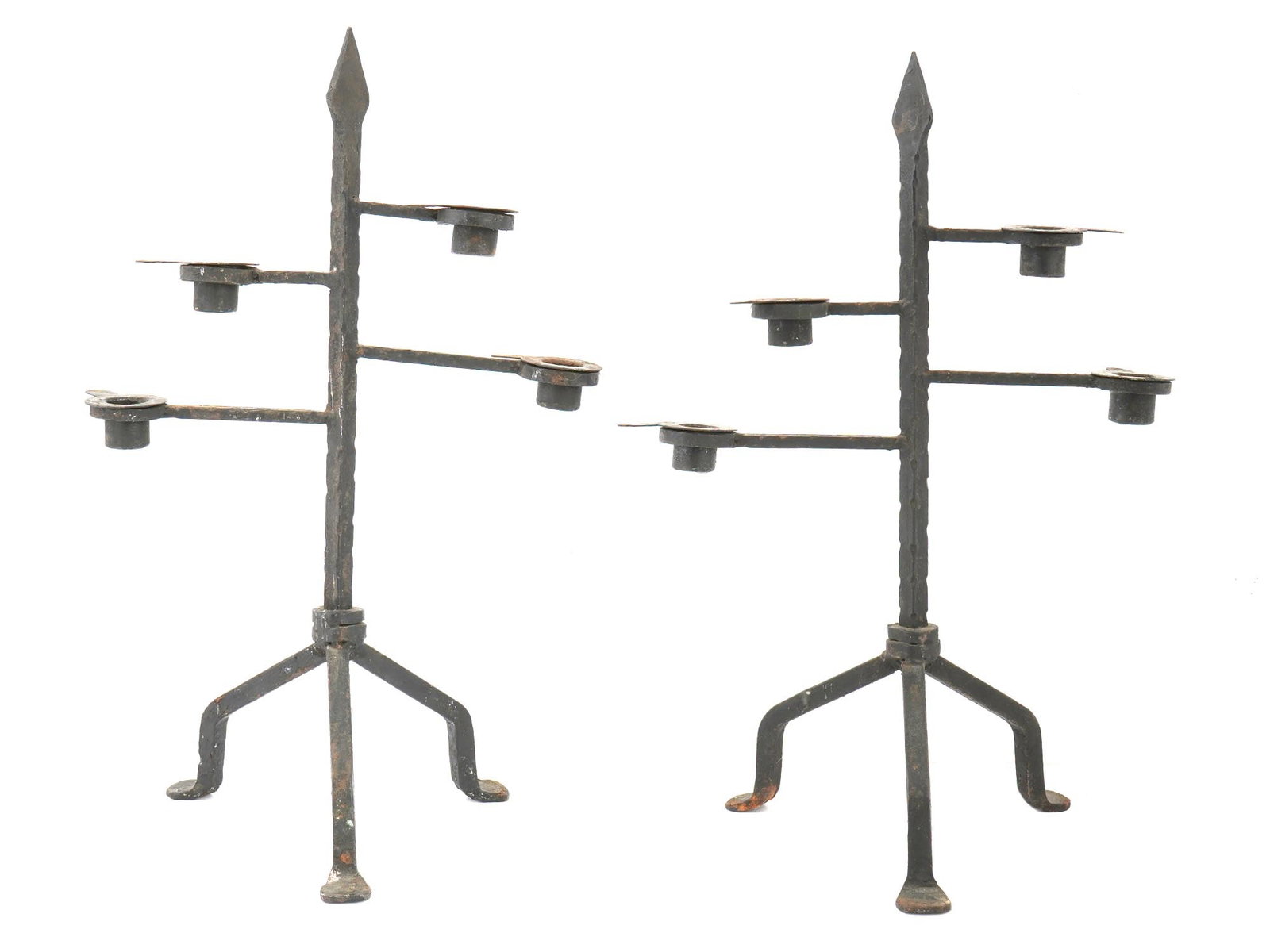 PAIR OF MINIMALISTIC DESIGN IRON CANDLE HOLDERS: A pair of iron candle holders. Each candle holder features a minimalist design with multiple arms extending from a central pole. The candle holders stand on a stable three legged base. Unmarked. Vinta