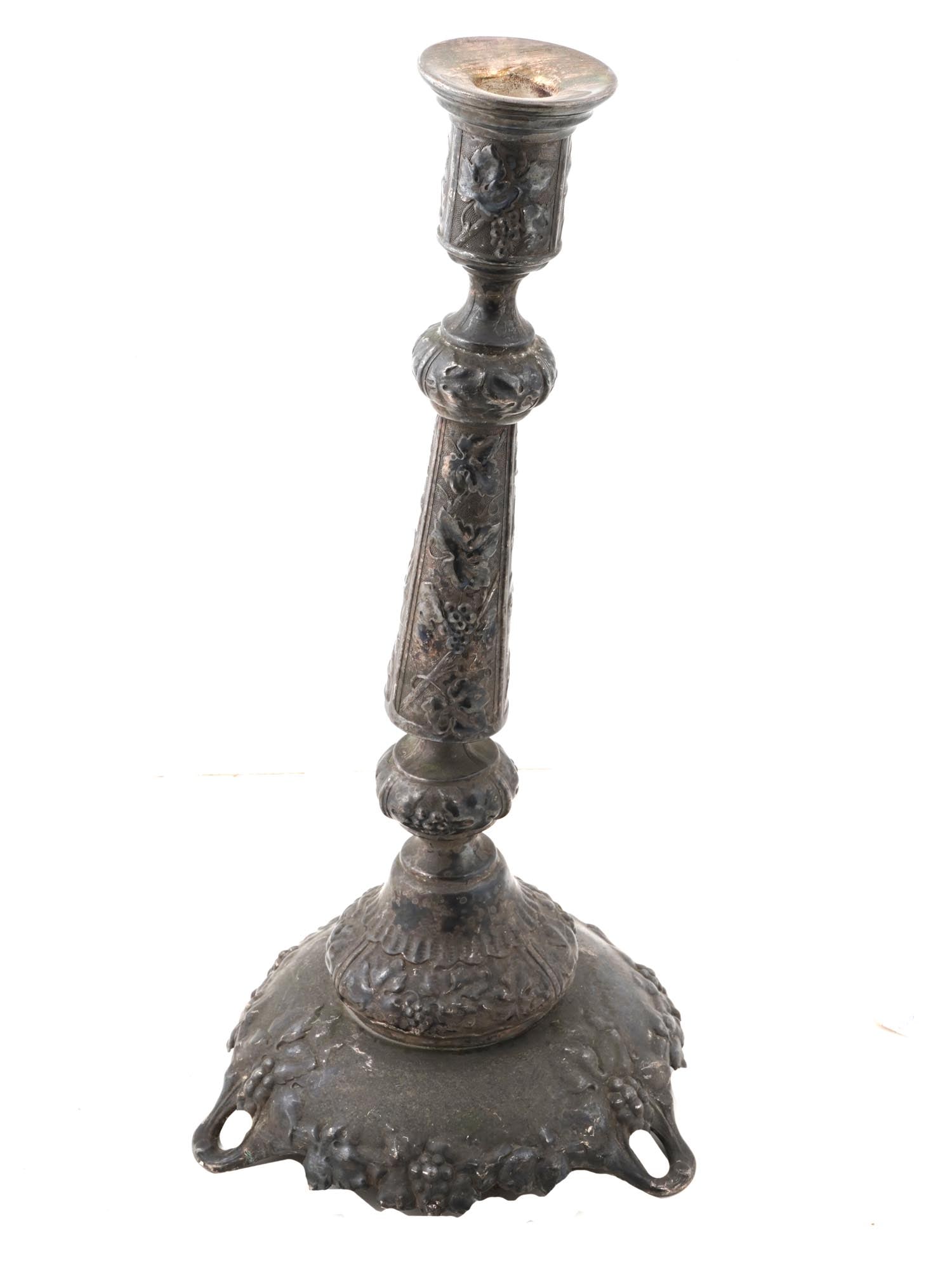 ANTIQUE NORBLIN AND CO SILVER PLATED CANDLE HOLDER: An antique Norblin and Co. silver plated candle holder, Warsaw, Poland, circa 1880. Delicately engraved with a grape vine motif. Marked with a manufactured mark and other markers on the bottom, signed