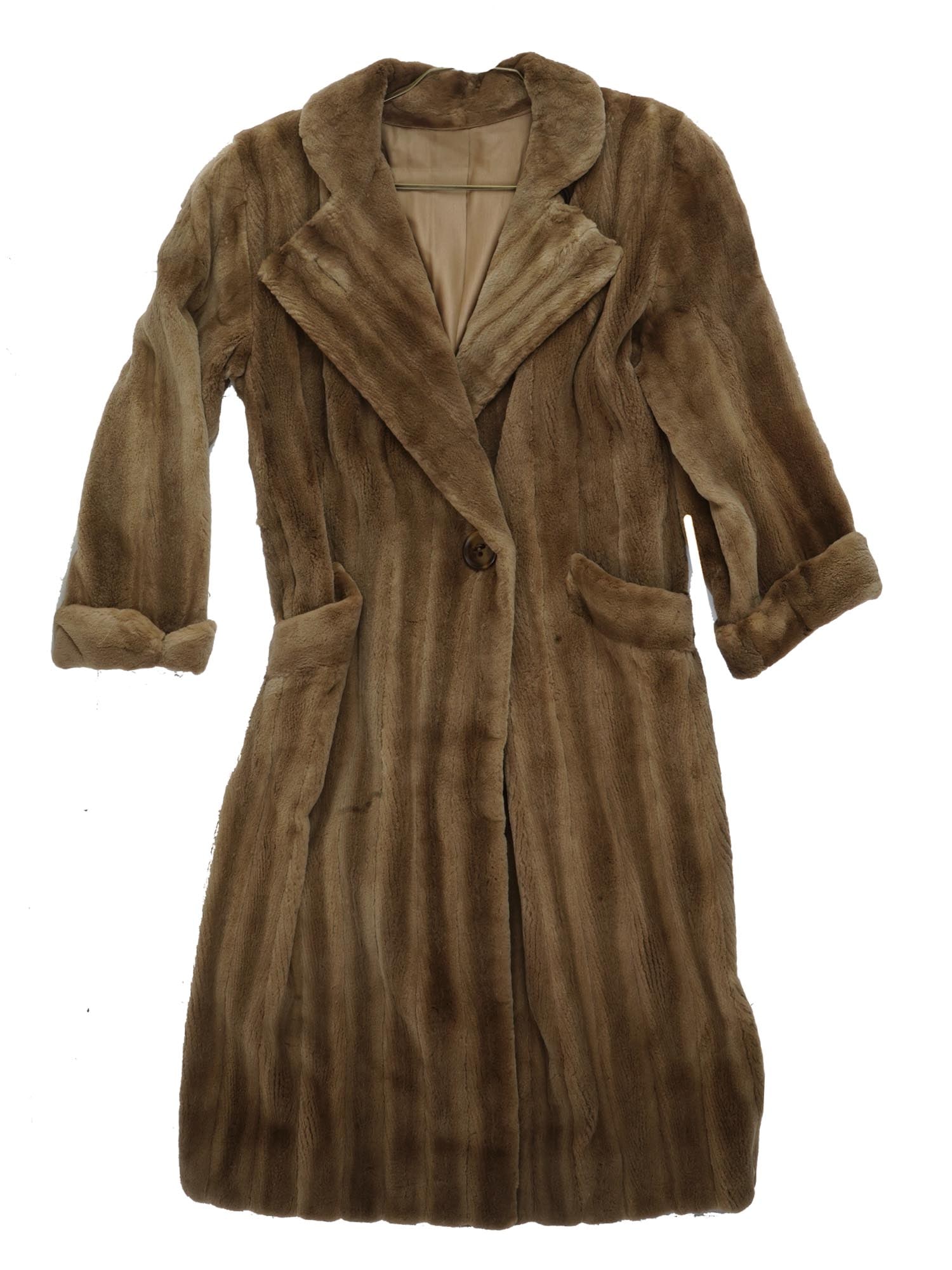VINTAGE BEIGE SHEER MINK FUR COAT: A vintage coat made of sheer mink. Beige color. Folded notch lapels can be buttoned up. Side pockets. Cotton lining with hand-emboridered number 57. Vintage Winter Clothing And Outerwear. THIS LOT IS 