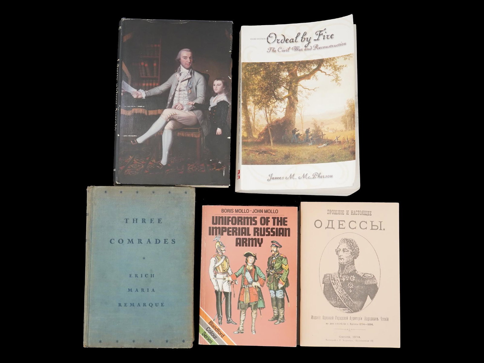 VINTAGE FICTION AND MILITARY HISTORY BOOKS UNIFORMS: A group of vintage fiction and military history books, including notable works on war, uniforms, and historical narratives. Titles include Ordeal by Fire, The Civil War and Reconstruction by James M. 