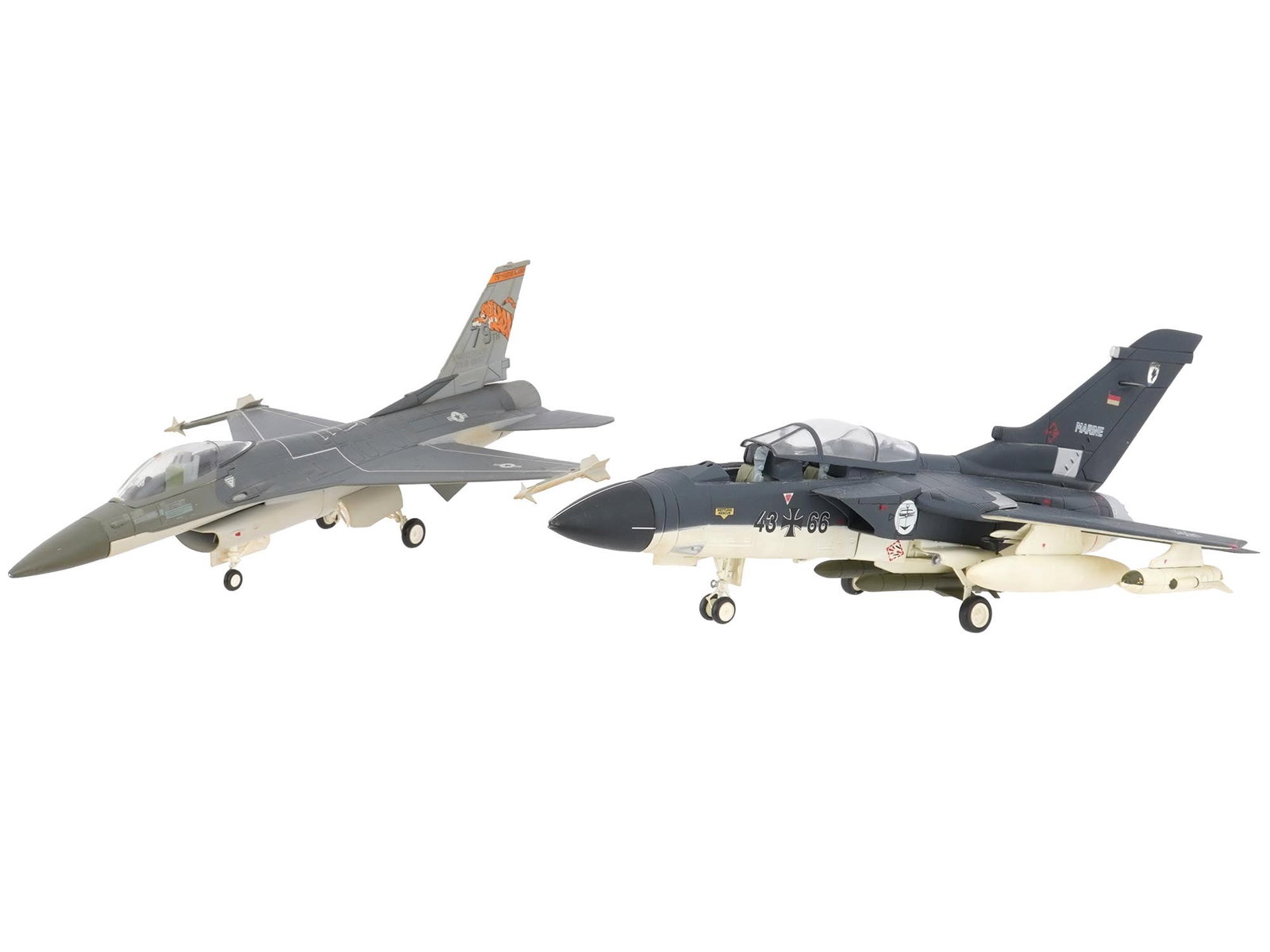 GERMAN TORNADO IDS AND AMERICAN F16 AIRCRAFT MODELS: A lot of two German and American metal combat aircraft models. The lot includes German Navy Tornado IDS aircraft from the MFG1 bomber group, 1980s. And American General Dynamics F16 Fighting Falcon, a