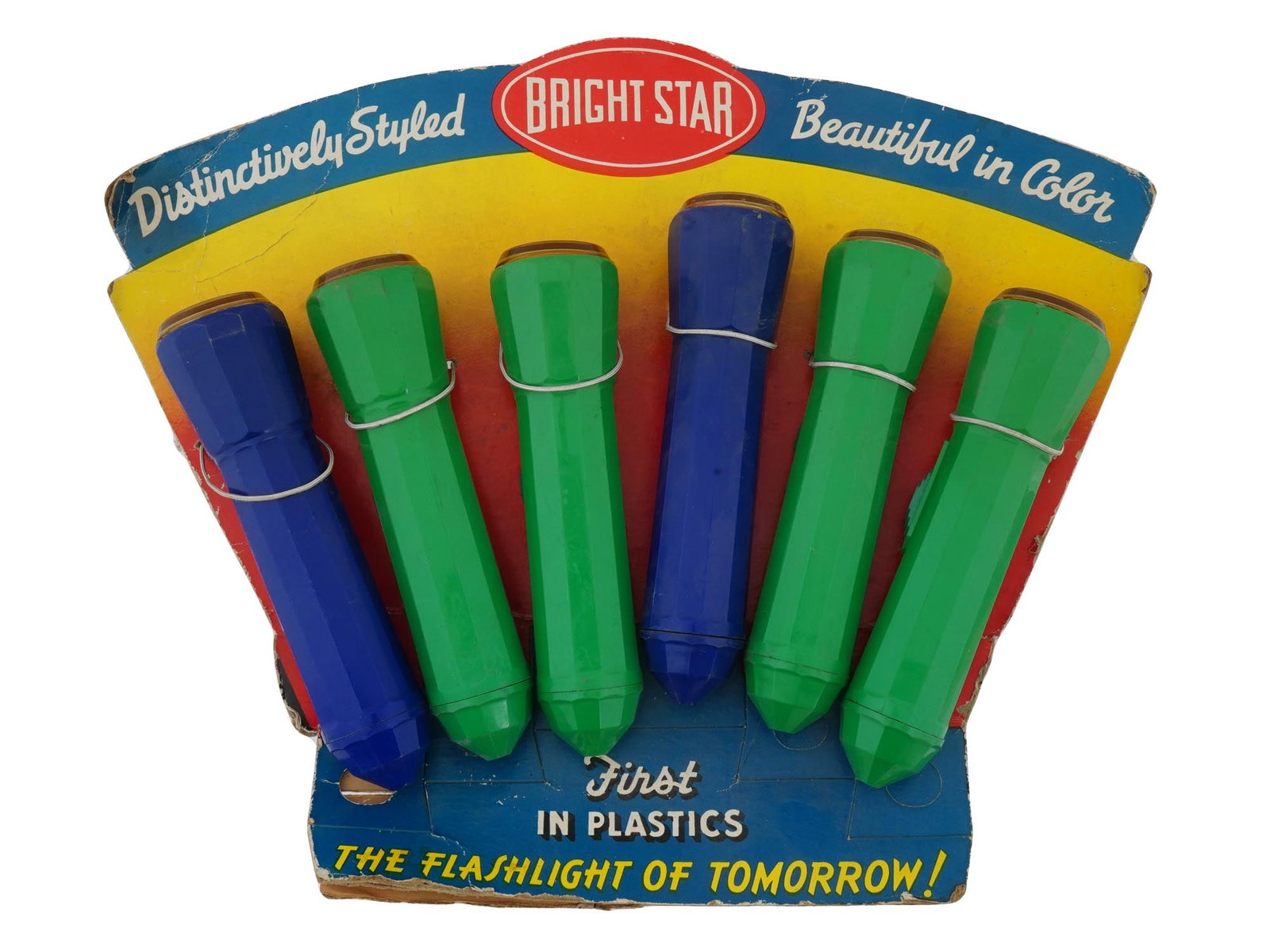 PACK OF AMERICAN BRIGHT STAR PLASTIC FLASHLIGHTS: A pack of six American Bright Star Plastic Flashlights. The pack includes three green and three blue flashlights, each featuring a glossy plastic exterior. Each flashlight is designed with a simple on