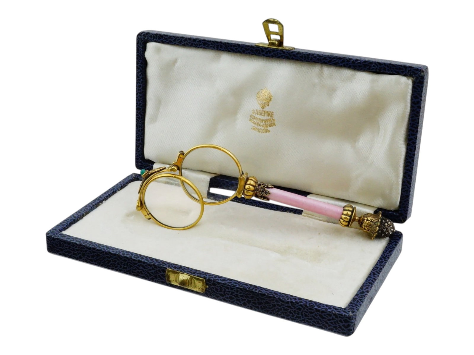 RUSSIAN SILVER ENAMEL OPERA LORGNETTE W DIAMONDS: An elegant Russian gilt silver and guilloche enamel folding opera lorgnette with diamonds. It features round lenses with a wide bow decorated with raised floral motifs and set with precious stones. Th