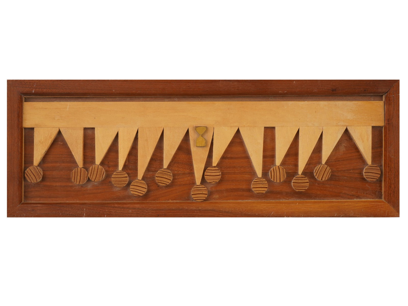 MID CENTURY MODERN WALL SCULPTURE WILLIAM WAGNER: A mid-century modern geometric wall sculpture executed in layered natural wood. The relief composition features a rhythmic arrangement of interlocking triangular forms accented by circular elements