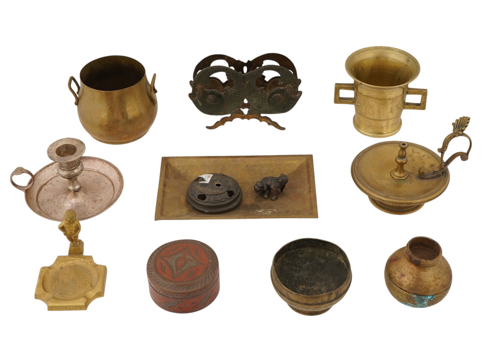 MIXED COPPER AND BRASS TABLEWARE ITEMS: A group of vintage and antique brass and copper items, including candlesticks, an incense burner, a mortar, a napkin holder, bowls, an ashtray, and a box. A total of 10 items. Antique and Vintage Bras