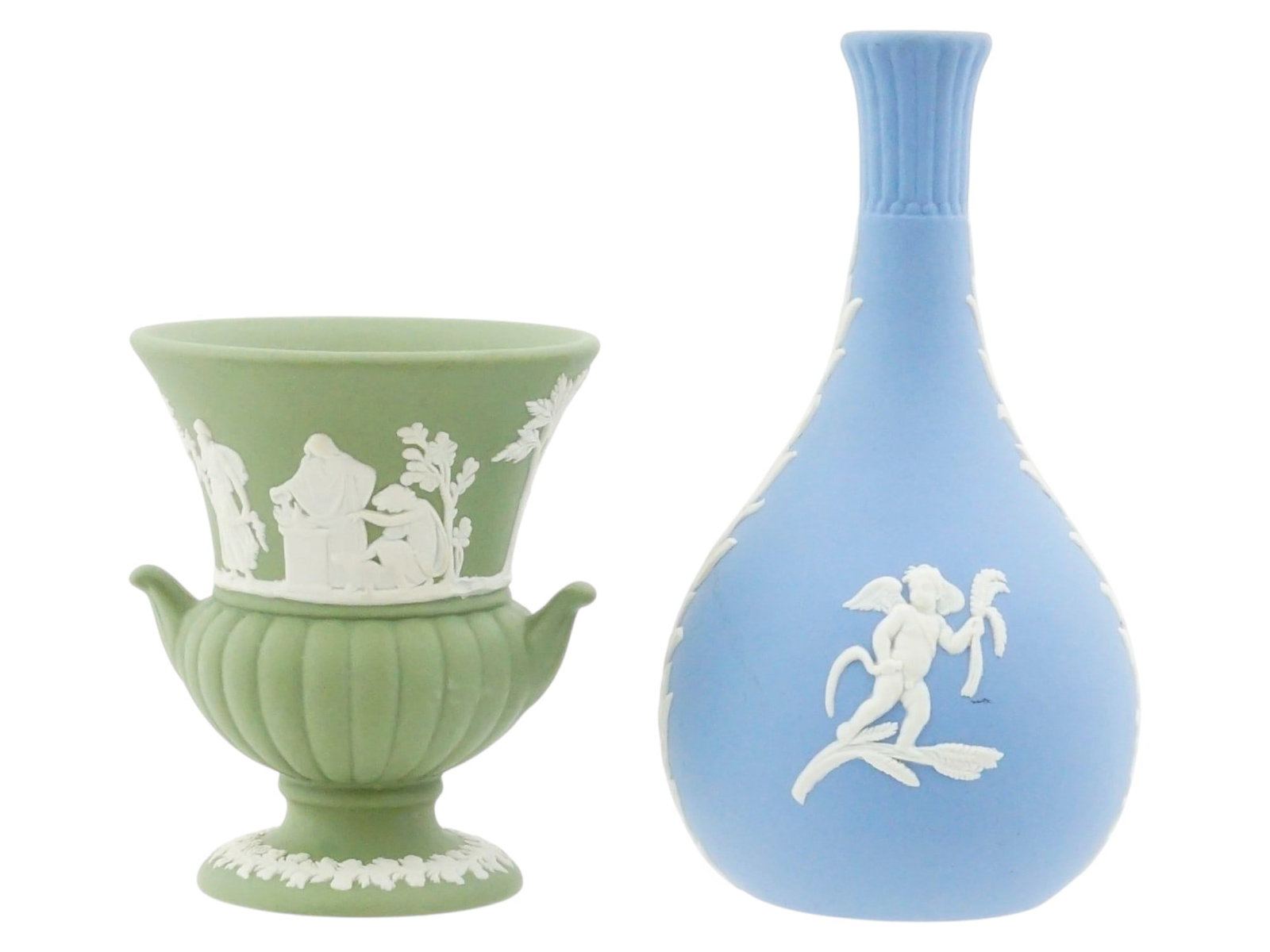 VINTAGE WEDGWOOD JASPERWARE PORCELAIN URN AND VASE: A pair of vintage Wedgwood Jasperware porcelain pieces, handcrafted in England. The group includes a sage green two-handled campana urn and a pale blue bud vase, both decorated with classic white neoc