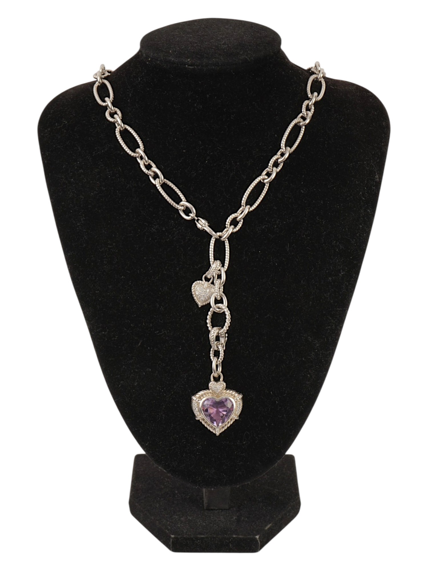 VINTAGE THAI JUDITH RIPKA AMETHYST SILVER NECKLACE: A vintage Thai Judith Ripka sterling silver necklace featuring a heart-shaped amethyst pendant accented with sparkling stones. The design showcases the artists signature textured metalwork, including 