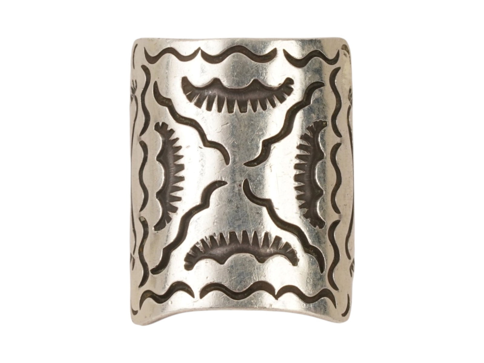 VINTAGE AMERICAN STERLING SILVER HAND STAMPED BAND RING: A vintage American sterling silver wide band ring featuring traditional hand-stamped motifs. The intricate patterns are enhanced by oxidized recessed areas. Finished with a comfort-tapered band. Marke