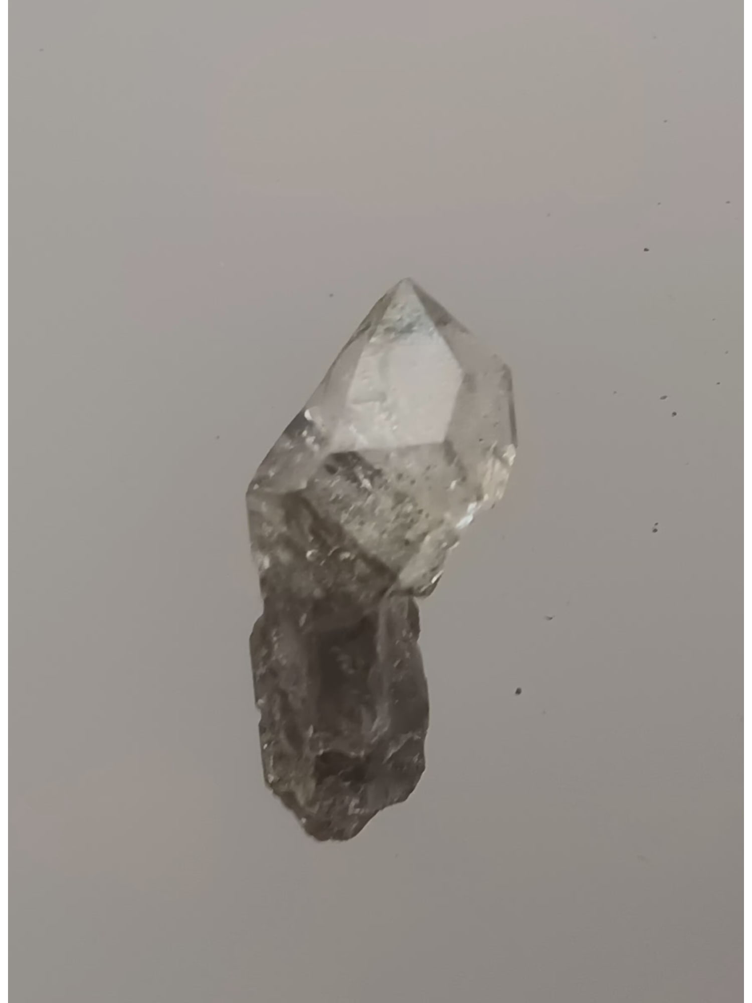 SKELETAL QUARTZ CRYSTAL: Skeletal quartz crystal with some black inclusions. (QU108/28) Weight: 1.90 grams. Origin: Yaogangxian mine, Hunan province. China. THIS LOT QUALIFIES FOR A 30-DAY UNCONDITIONAL RETURN FROM THE DATE O