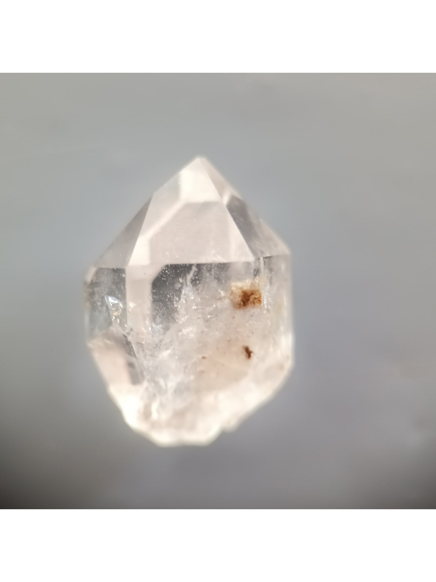 QUARTZ VAR. HERKIMER DIAMOND: Clear quartz var. herkimer diamond with some crazing. One side is slightly damaged. (HD8/70) Weight: 2.8 grams. Origin: Ace of Diamonds mine, Middleville, New York, USA. THIS LOT QUALIFIES FOR A