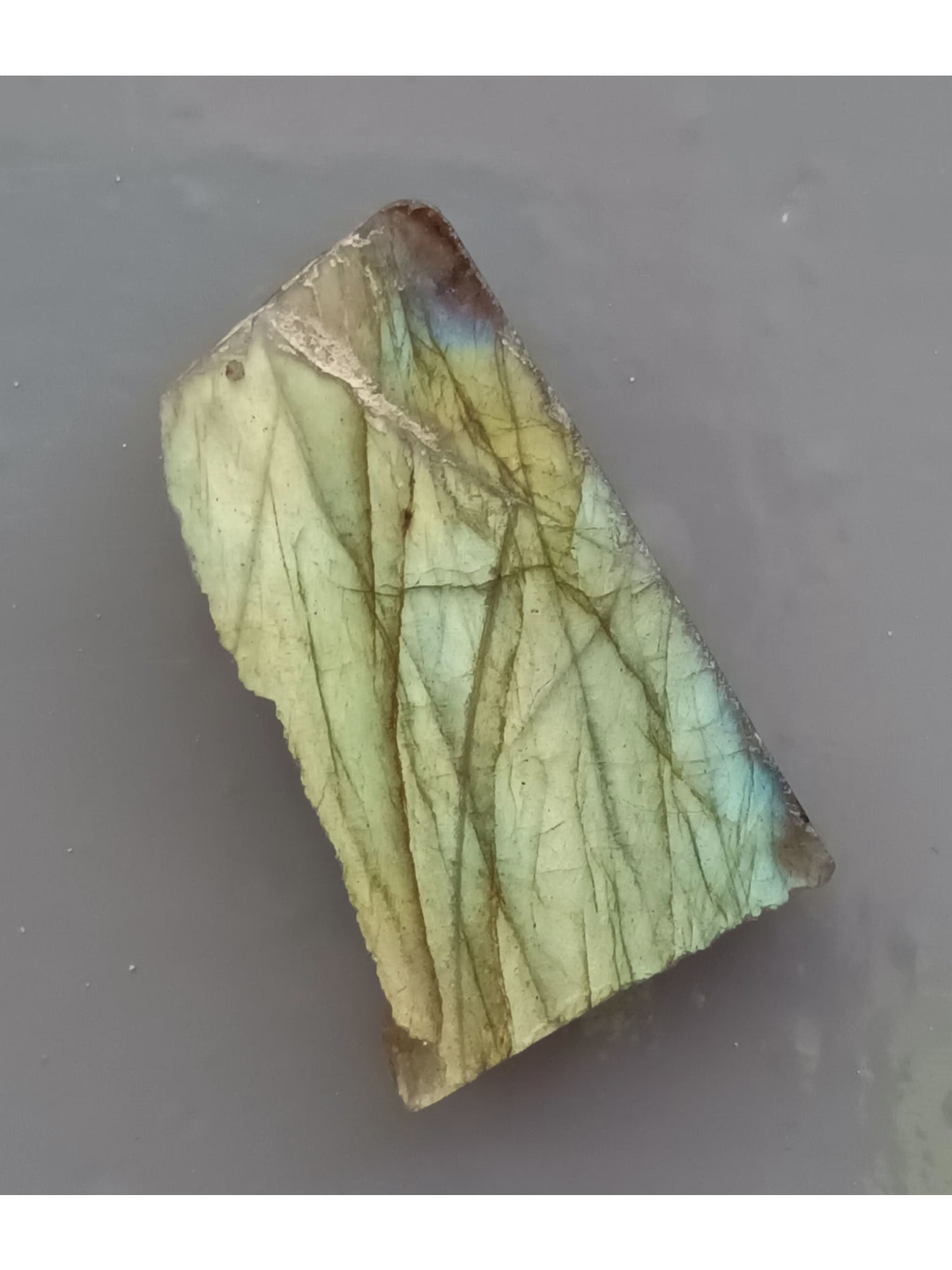 IRIDENSCENT LABRODORITE: Iridescent, multicolor & translucent labradorite. (LAB2/57) Weight: 10 grams. Origin: Ampanihy, Atsimo-Andrefana, Madagascar. THIS LOT QUALIFIES FOR A 30-DAY UNCONDITIONAL RETURN FROM THE DATE OF