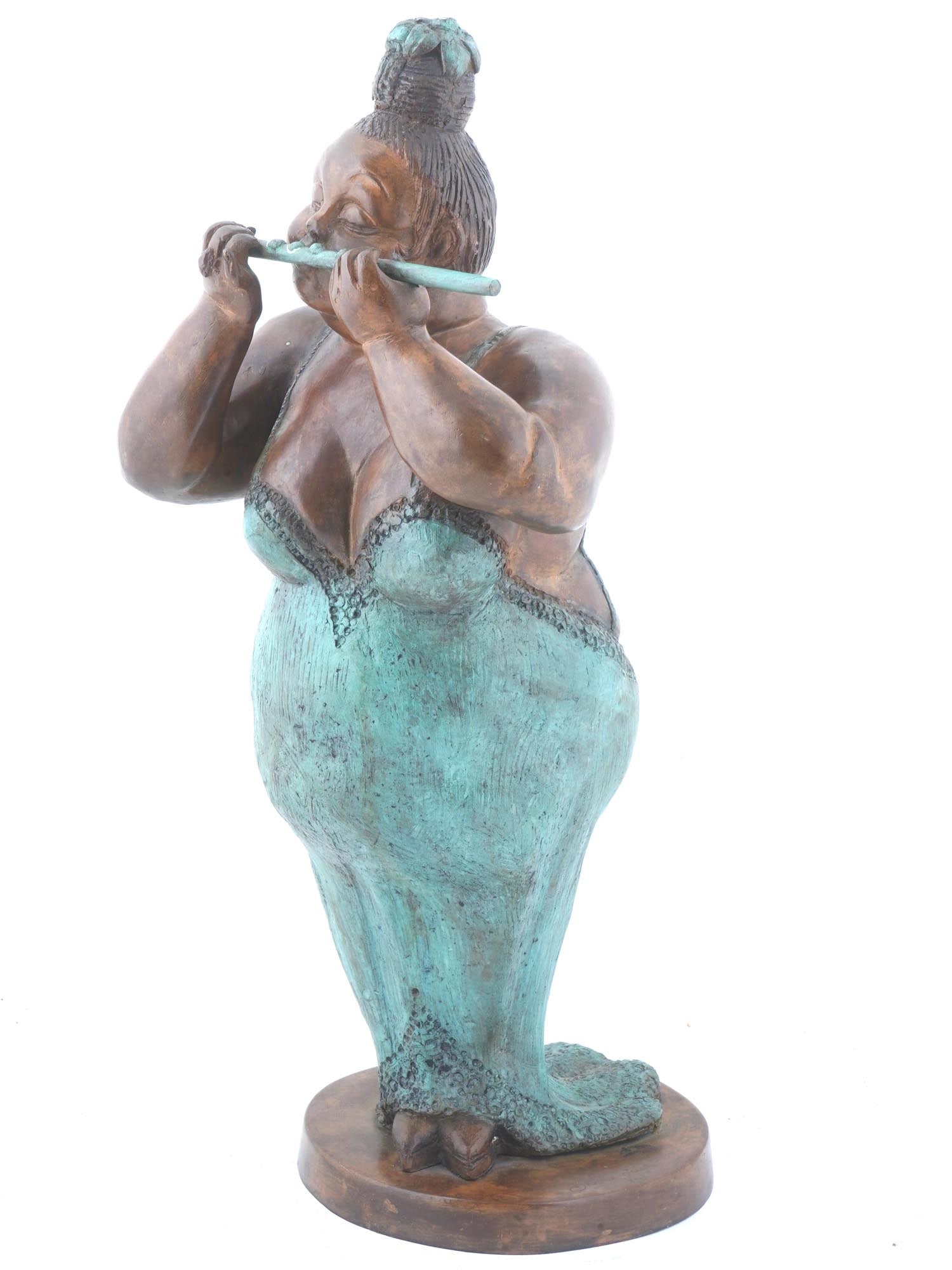 MEXICAN BRUNO LUNA BRONZE SCULPTURE LA FLAUTISTA: A vintage, 1990, limited edition patinated cast bronze sculpture by Bruno Luna, born 1963, a Mexican artist known for his signature voluptuous figures. The artwork is titled La Flautista and represent