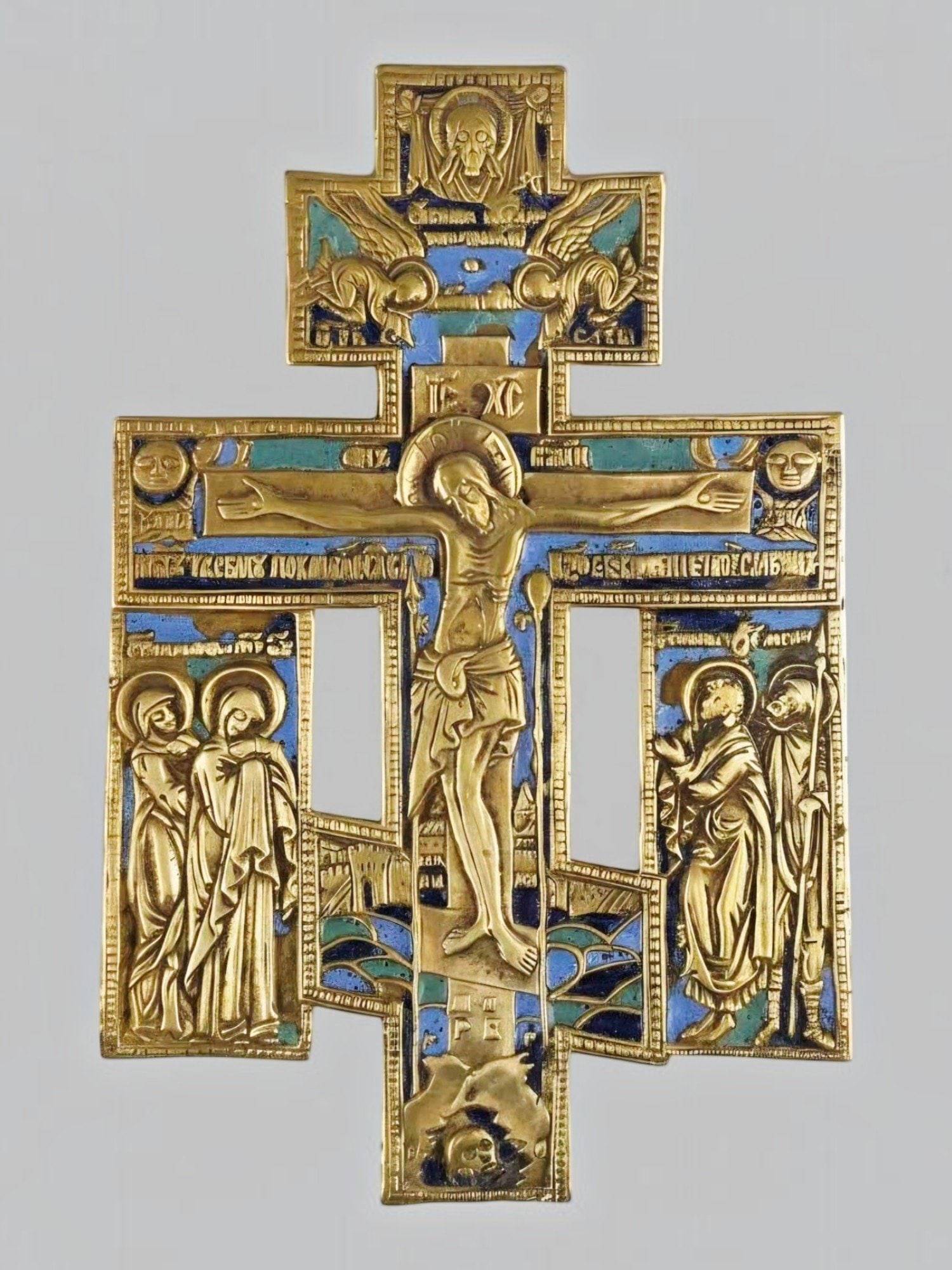 18TH C RUSSIAN OLD BELIEVER BRONZE ENAMEL CRUCIFIX CROSS: A finely cast 18 century Russian Old Believer bronze crucifix with original blue and turquoise enamel decoration. The front depicts the Crucifixion flanked by the Virgin Mary and Saint John the Theolo