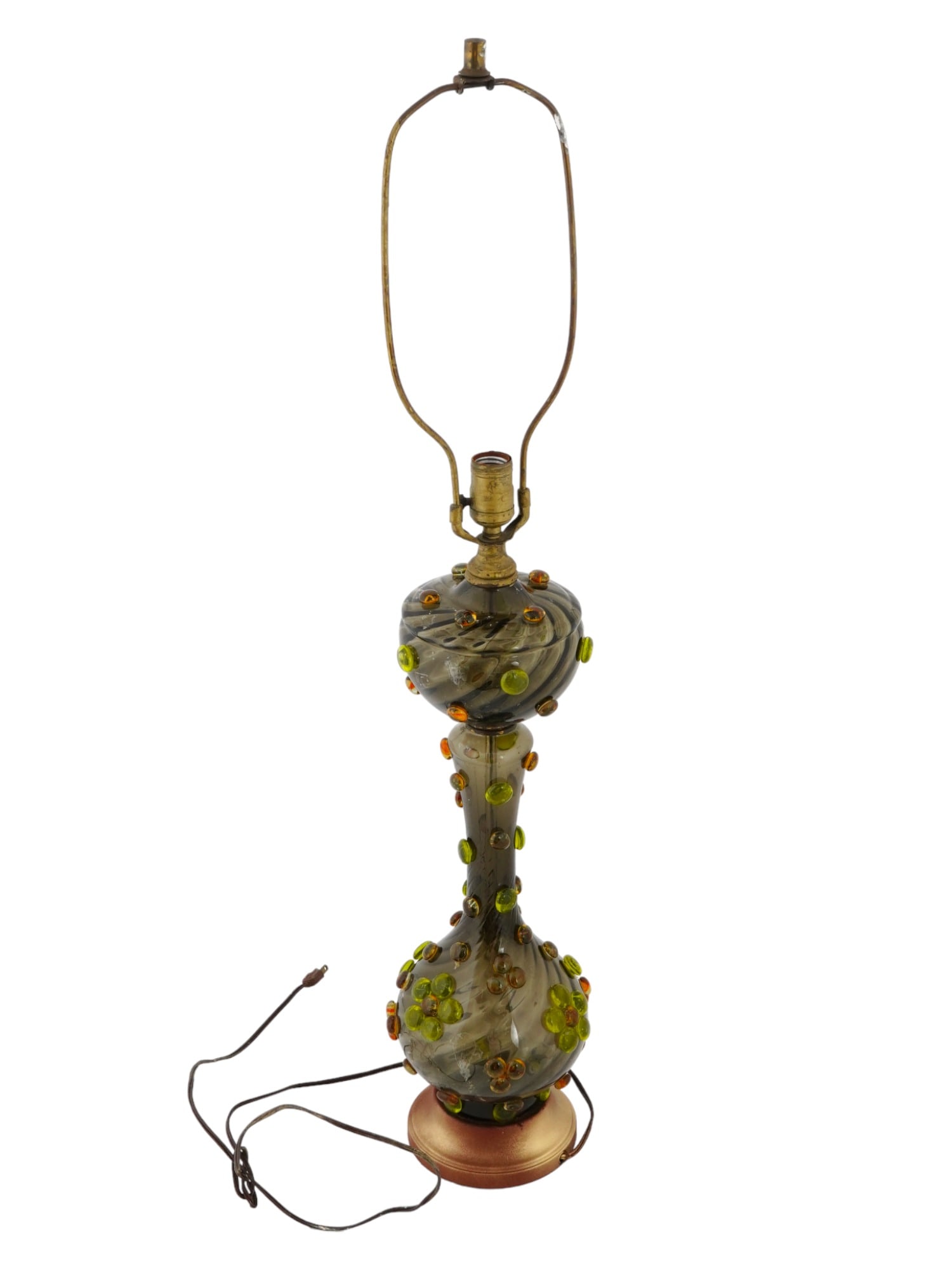 VINTAGE DECORATIVE TABLE LAMP LATE 20TH CENTURY: A vintage decorative table lamp without shade. Circa late 20th century. The lamp has a bracket that allows you to install another lampshade. Decorated with overlaid green and orange glass decoration. 