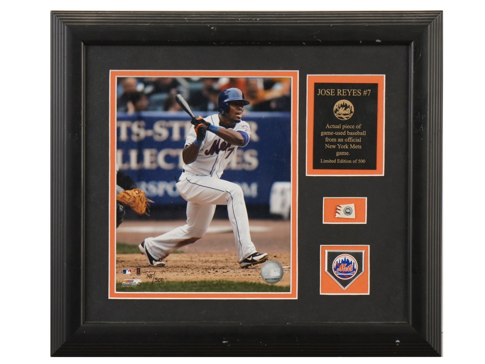 LTD JOSE REYES PIECE OF GAME USED BASEBALL PLAQUE: A limited edition collectible collage dedicated to former New York Mets baseball player Jose Reyes. The photo depicts Jose Reyes at the plate. The plaque: text lists the players name, number 7, and au