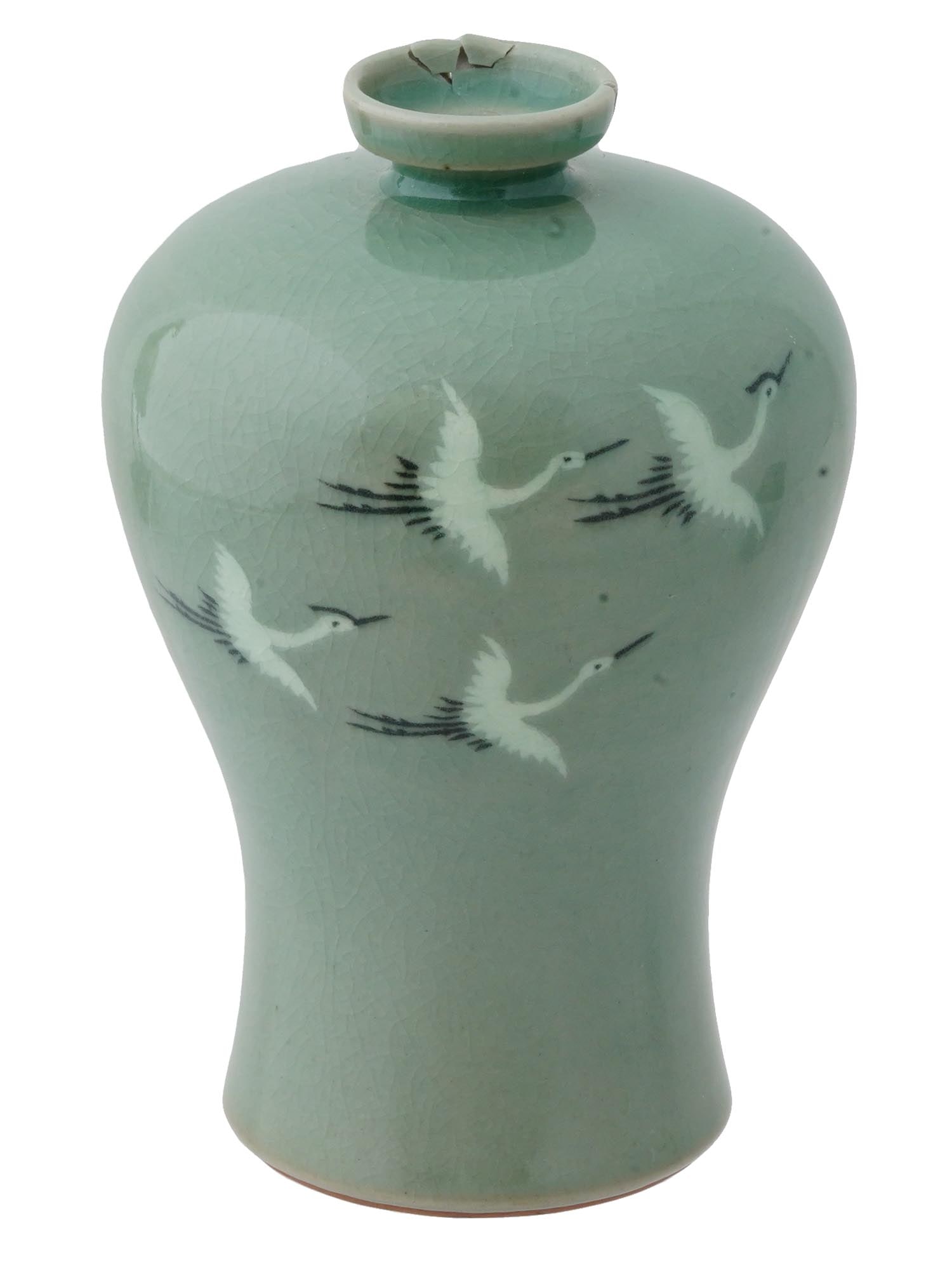 ANTIQUE ASIAN GLAZED PORCELAIN CELADON VASE: An antique Asian glazed porcelain vase. The ?raquelure celadon vase with a rounded body and a shortened narrow neck. The upper part depicts flying white cranes, a symbol of immortality, prosperity, an