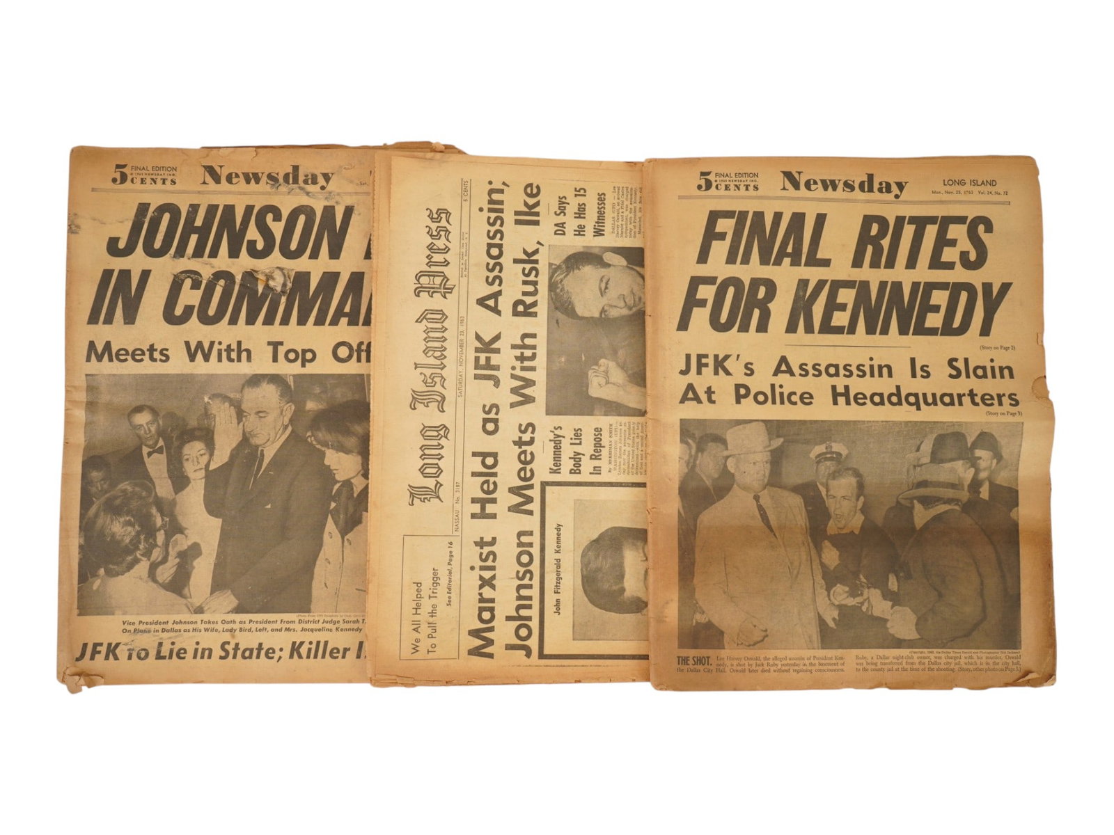 LOT OF THREE 1963 LONG ISLAND PRESS JFK NEWSPAPERS: A group of three vintage regional newspapers from New Yorks Long Island area covering the historic November 1963 assassination of President John F. Kennedy and its immediate aftermath. The first is ti