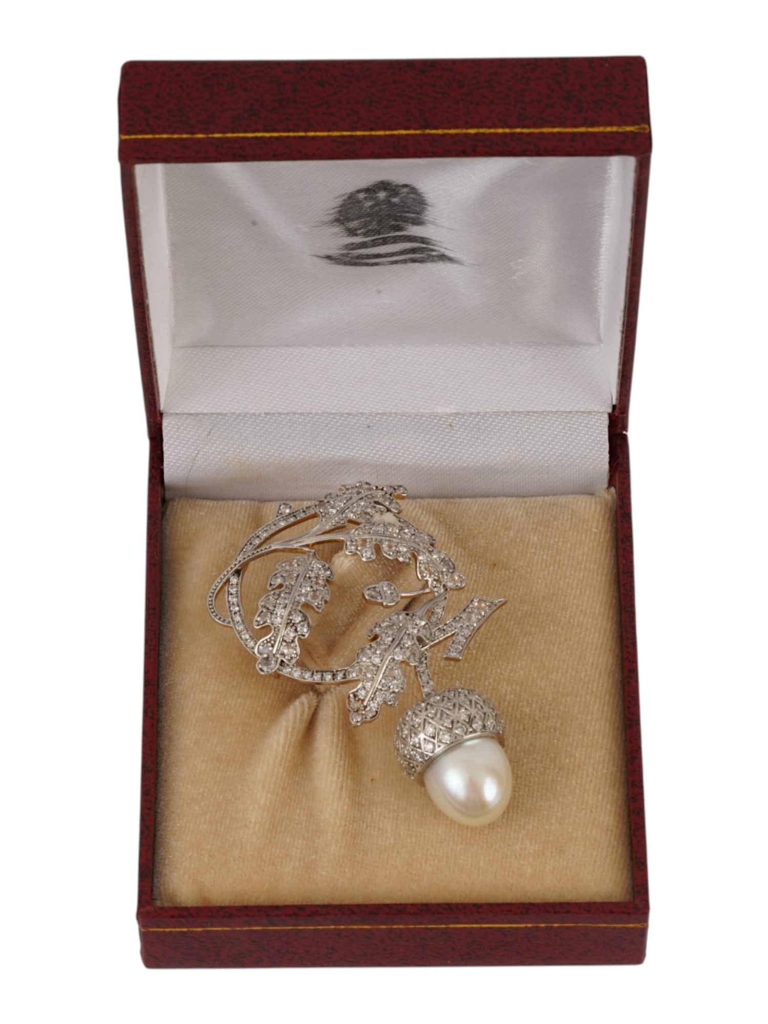 RUSSIAN GOLD SILVER DIAMOND PEARL ACCORN BROOCH: A Russian gold and silver pin brooch representing oak leaves and an accorn. The piece is richly garnished with diamonds. The accorn is made of a natural pearl. Hallmark of 56 gold standard and makers 