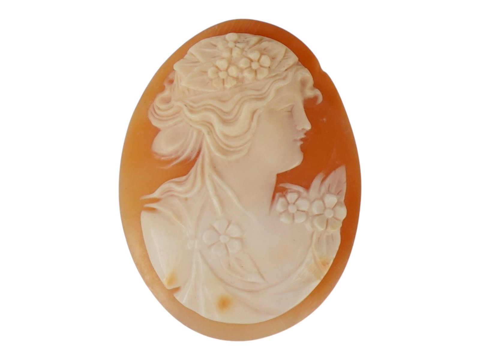 ANTIQUE CARVED SHELL LADY PORTRAIT CAMEO: An antique hand-carved shell cameo depicting the profile of a woman in Victorian style. Carved from conch shell, it features the characteristic orange-pink background with a white foreground, creating
