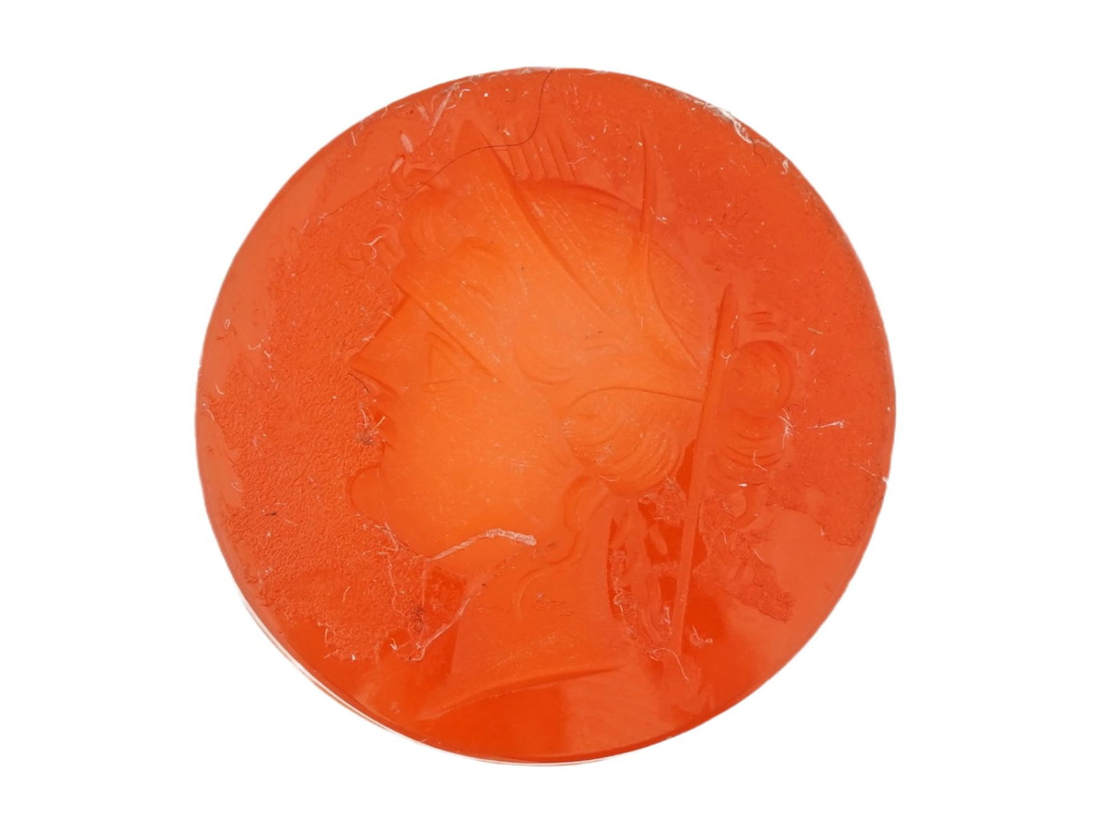 ANTIQUE VICTORIAN CARVED CARNELIAN INTAGLIO SEAL: An antique Victorian carved carnelian intaglio seal, round in form, depicting a profile bust of a female figure, likely an ancient Roman goddess. Executed in the traditional intaglio technique, the de