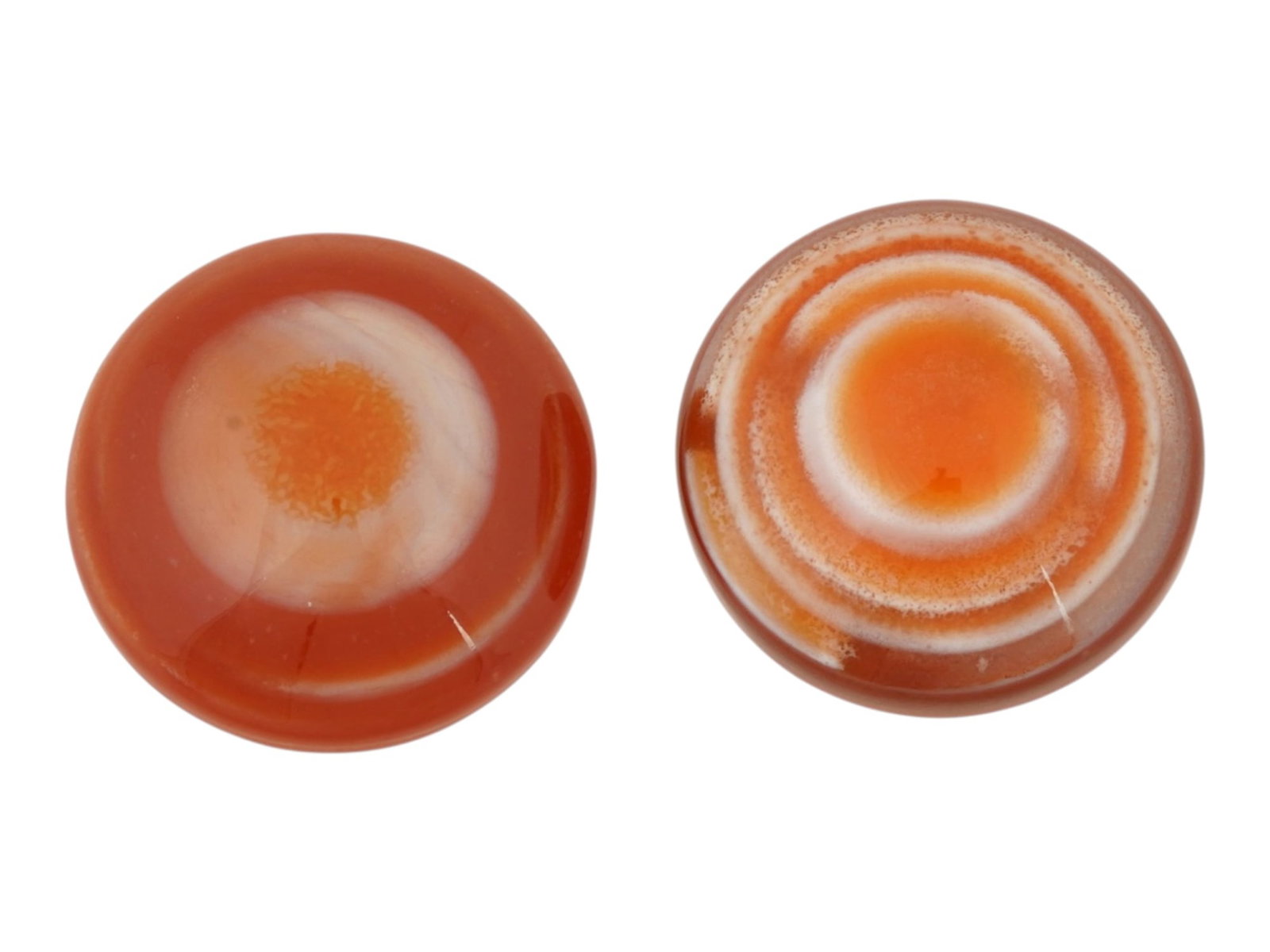 PAIR OF LARGE NATURAL SARDONYX BANDED AGATE CABOCHON: A pair of large natural sardonyx banded agate cabochons. The polished gemstones display rich translucent layers of orange, reddish-brown, and white. Natural Gemstones And Jewelry Collectibles. THIS