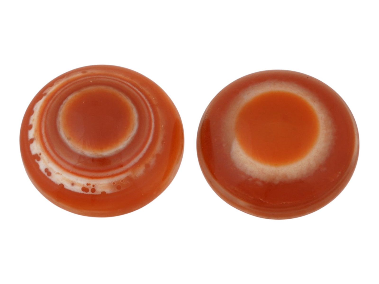 PAIR OF LARGE NATURAL SARDONYX BANDED AGATE CABOCHON: A pair of large natural sardonyx banded agate cabochons. The polished gemstones display rich translucent layers of orange, reddish-brown, and white. Natural Gemstones And Jewelry Collectibles. THIS