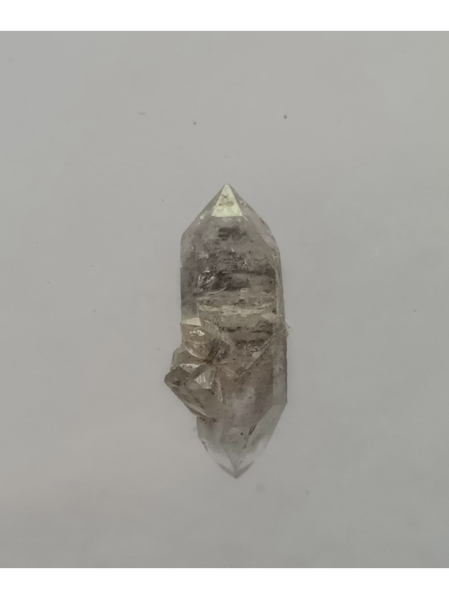 BITERMINATED QUARTZ CRYSTAL: Biterminated quartz crystal with attached crystal cluster. Weight: 1.79 grams. Origin: Lechang mine, Guangdong, China. (QU140/45) THIS LOT QUALIFIES FOR A 30-DAY UNCONDITIONAL RETURN FROM THE DATE OF