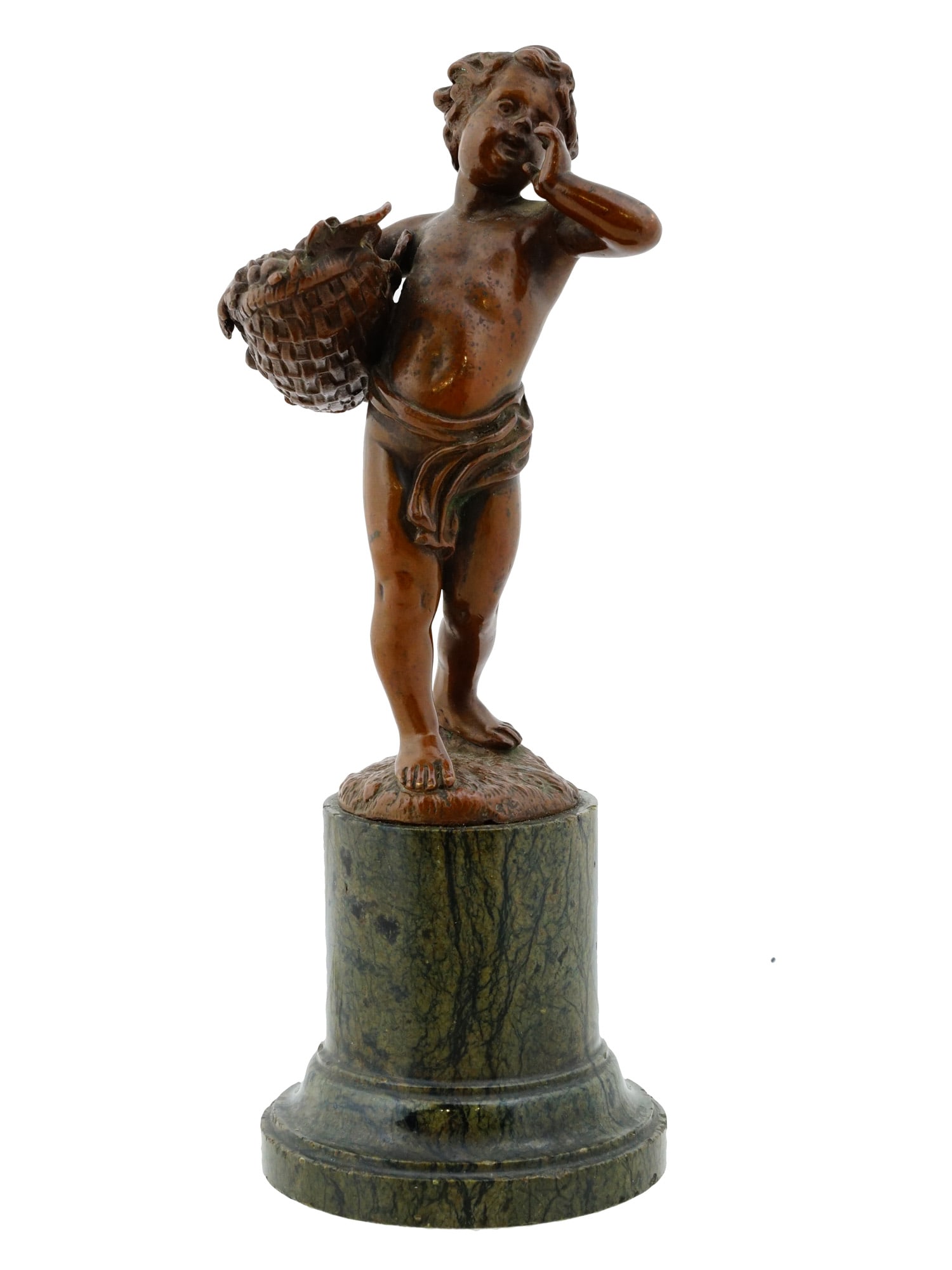ATTR EUGENE BARILLOT FRENCH BRONZE SCULPTURE: A French patinated bronze sculpture attributed to Eugene Barillot, 1841 to 1900. The figure depicts a young Bacchus with a basket of fruits. Mounted on the round high pedestal. Signed Barillot on the 