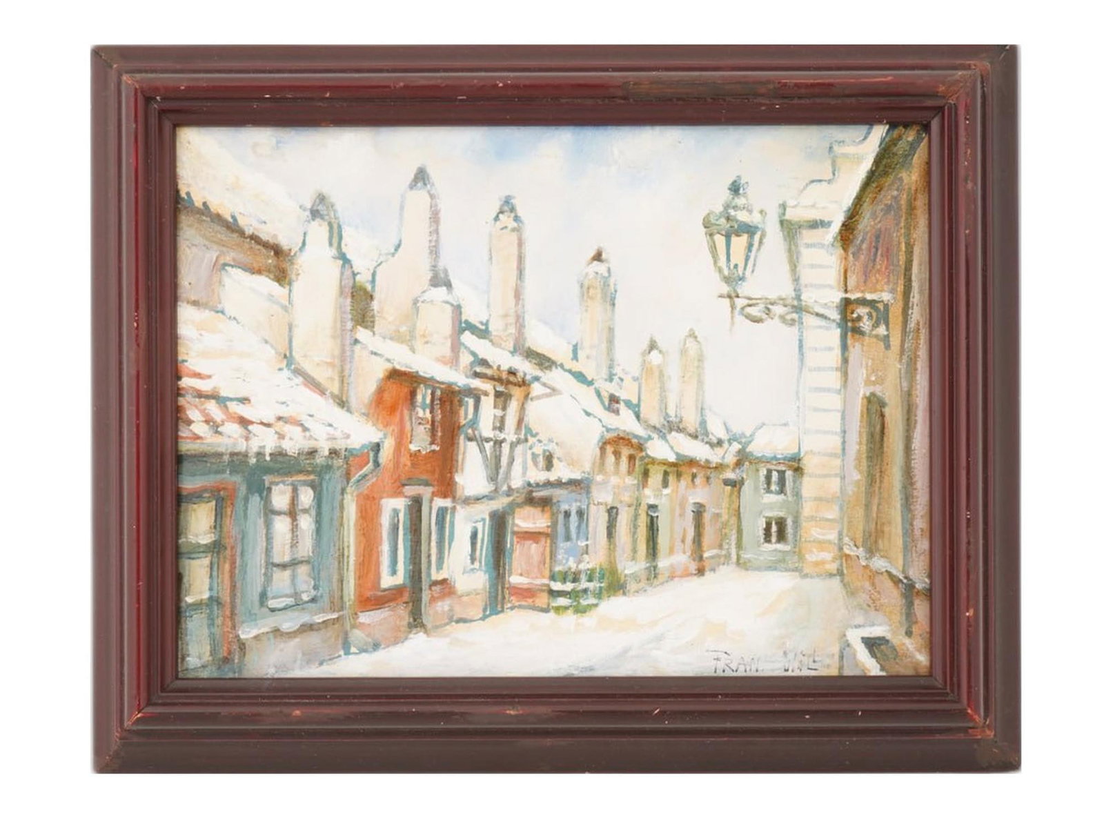 FRENCH OIL PAINTING BY FRANK WILL A STREET VIEW: Frank Will, French, 1900 to 1951, an oil painting on board depicting a narrow, snow-covered street lined with historic architecture, including gabled rooftops and tall chimney stacks. Signed lower rig