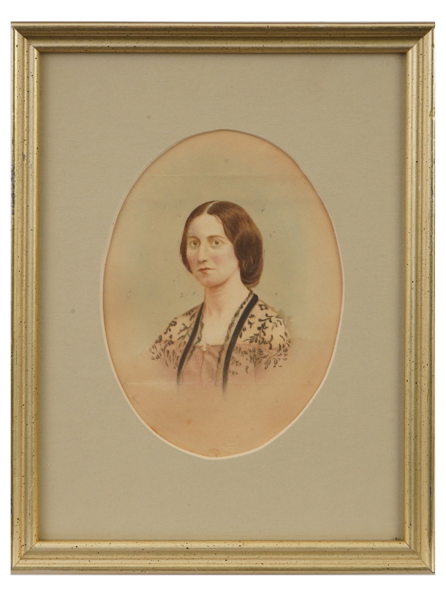 ANTIQUE EUROPEAN SCHOOL WATERCOLOR PORTRAIT PAINTING: An antique, 19th century European School watercolor on paper portrait painting. The portrait depicts an oval female portrait, with the lady dressed in Victorian fashion. Unsigned. Beige mat, gilt fram