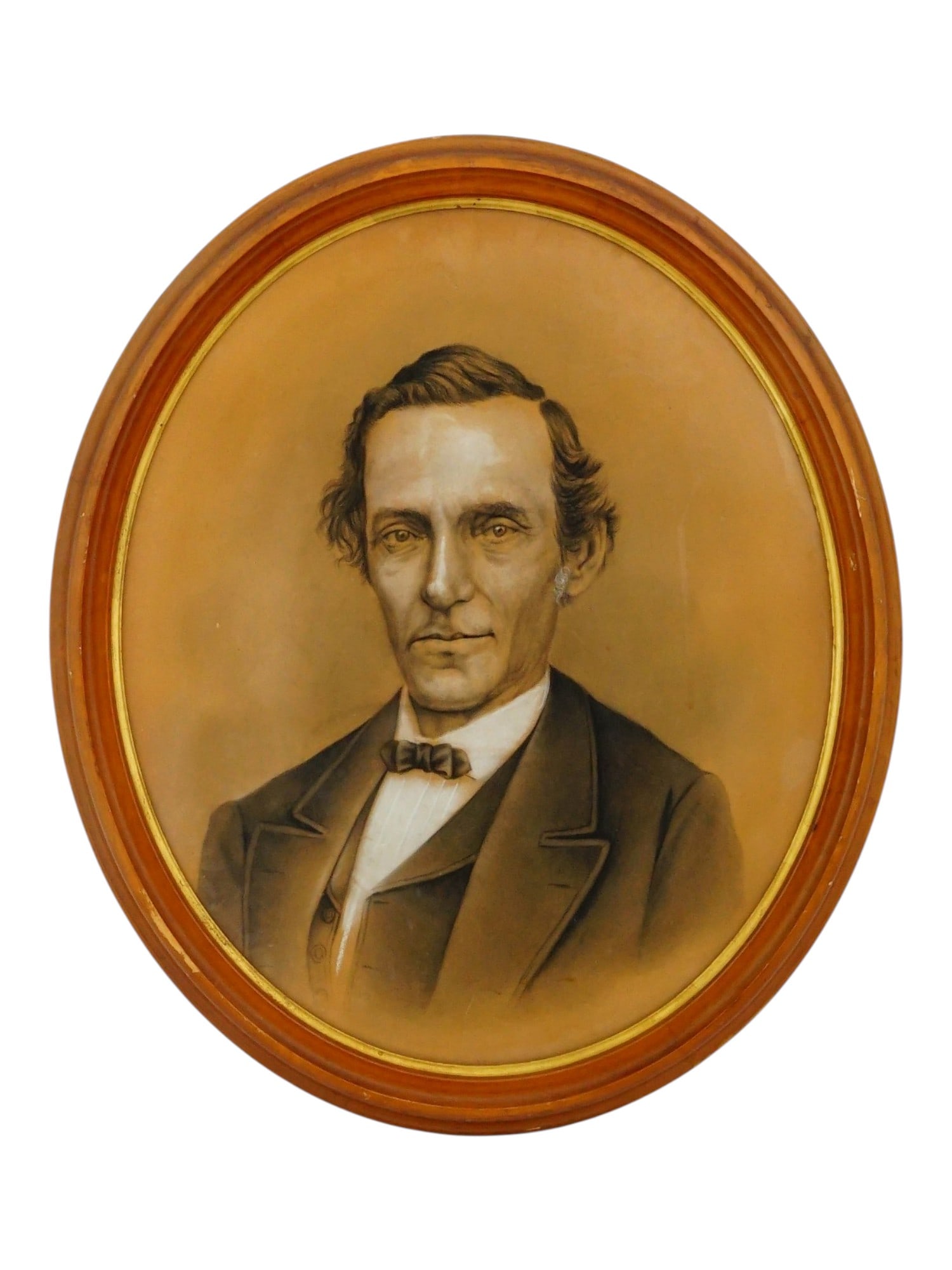 ANTIQUE AMERICAN MALE PORTRAIT PASTEL PAINTING: Pastel and white chalk painting on paper. American, late 19th to early 20th century. The artwork depicts a male portrat, presumably of Abraham Lincoln or Jefferson Davis. Oval format. Unsigned. Framed