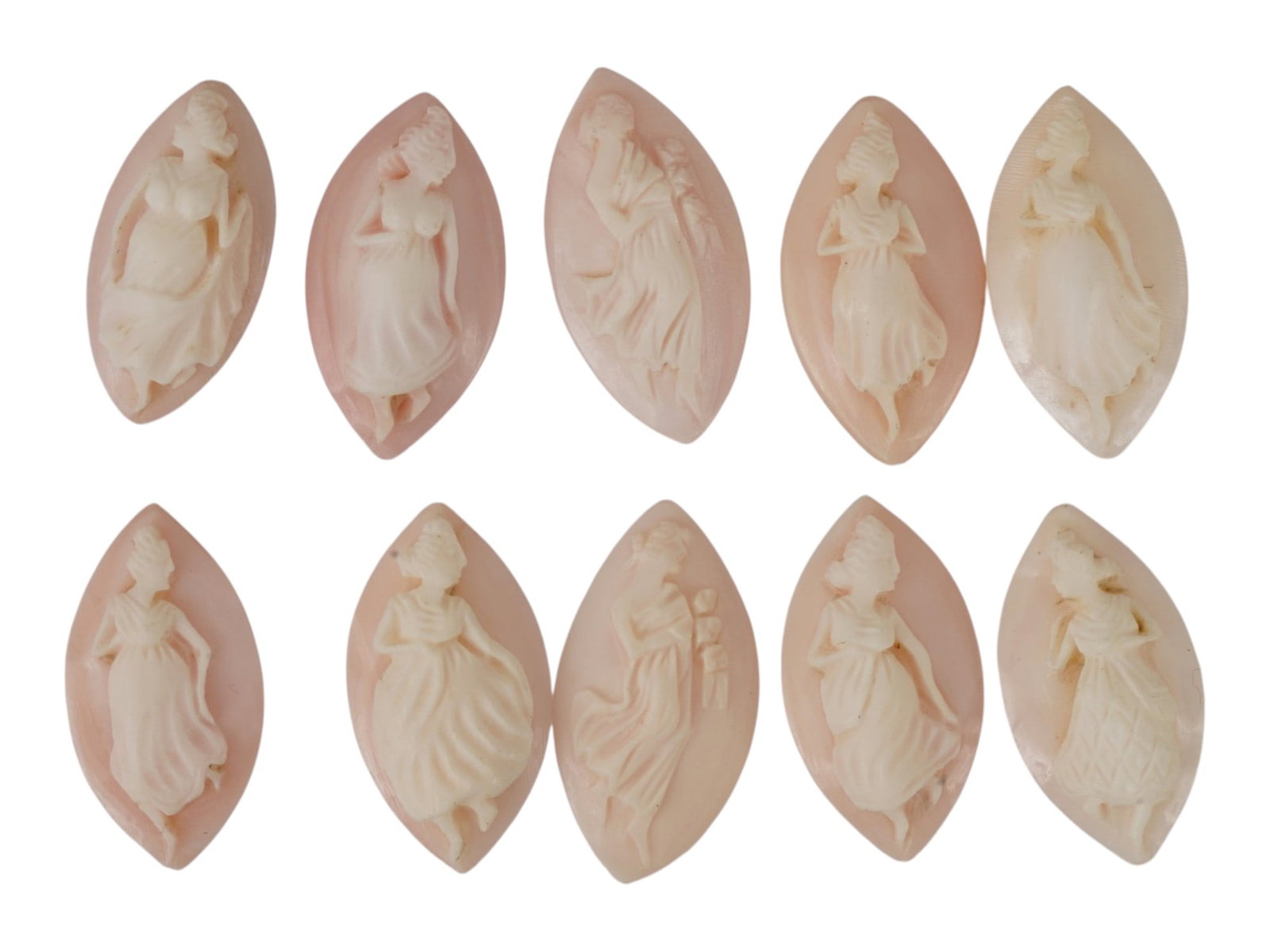 LOT OF FEMALE PORTRAIT CARVED PINK CORAL CAMEOS: A lot of 10 hand carved pink coral cameos. Each piece depicts a female profile portrait or nymph rendered in high relief. Marquise shape. Collectible Jewelry And Glyptic Art, Sculpture. THIS LOT IS EL