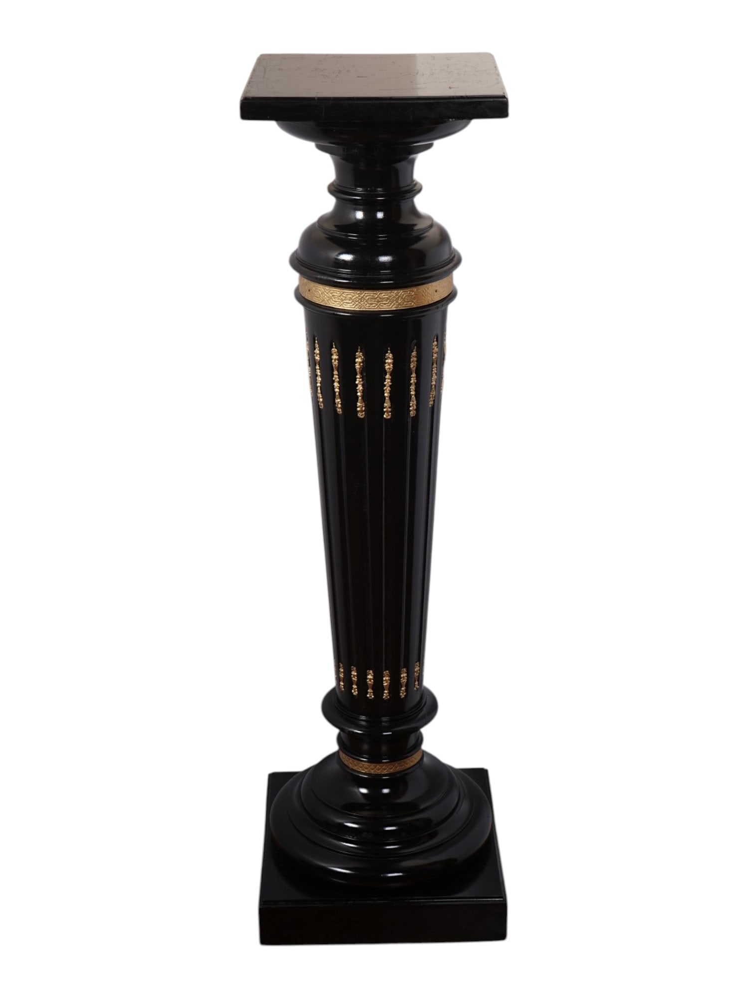 ANTIQUE VICTORIAN WOOD PEDESTAL WITH BRASS INLAYS: An antique Victorian painted black and varnished wood pedestal. Circa 19th to early 20th century. Modeled after a column with a flat top, it features patterned brass inlays. Designed for displaying ar