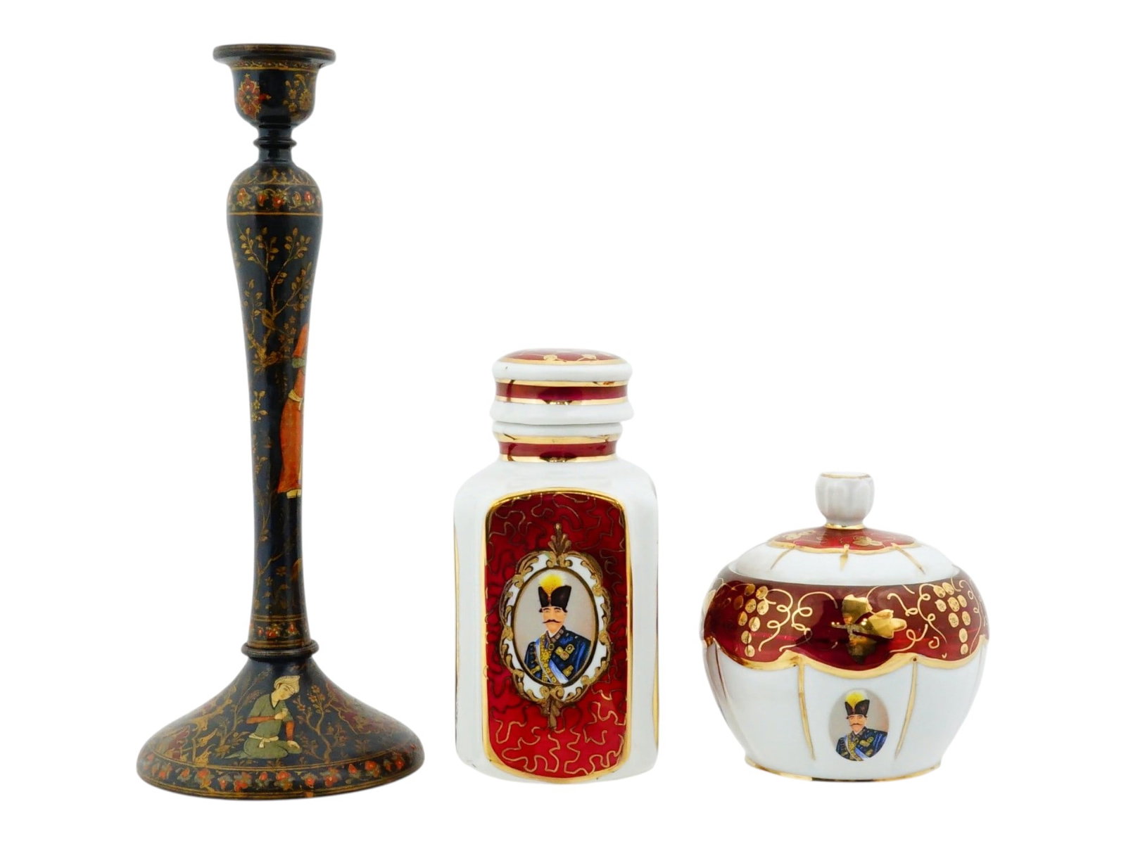 LOT OF PERSIAN WOODEN CANDLESTICK AND PORCELAIN JARS: A lot of three vintage Persian decorative items. Hand-painted wooden candlestick with elaborate floral ornaments and traditional-style figures. A porcelain sugar and matching lidded jar by Toos Chini 