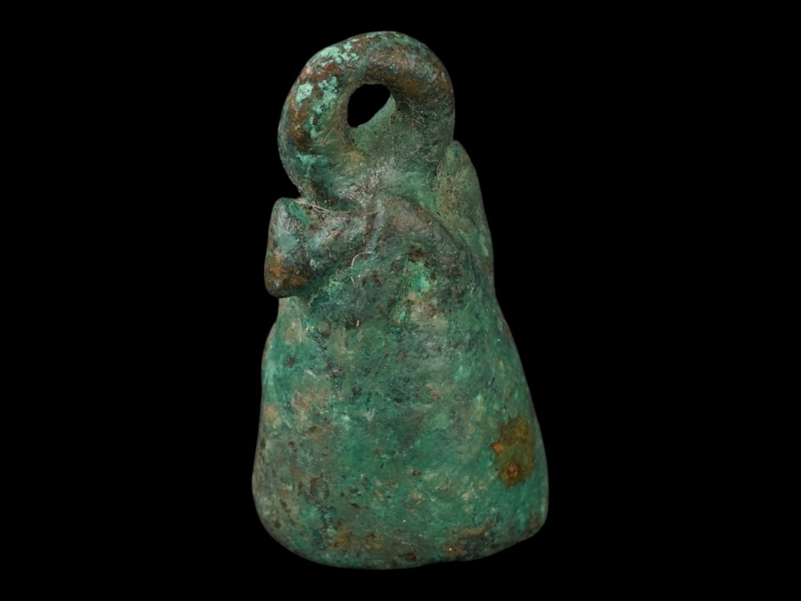 ANCIENT JUDAICA ASTARTE BRONZE BELL 1ST MILLENNIUM BC: An ancient Judaica cast bronze bell, dating from the 1st Millennium BC. The ware features iconographic motifs associated with Levantine deities. The conical body is decorated in relief with a standing