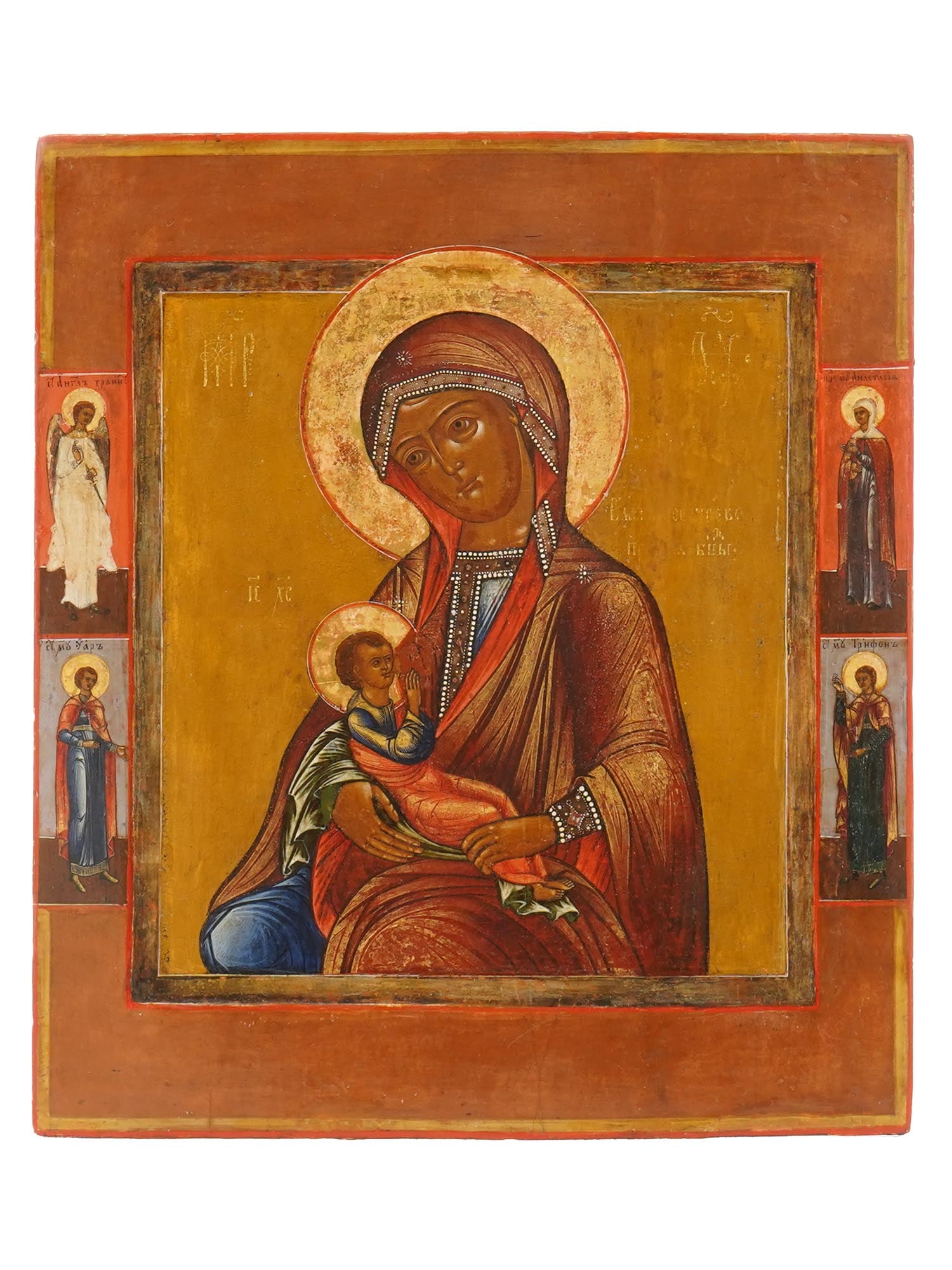 ANTIQUE RUSSIAN ICON MOTHER OF GOD THE MILKGIVER: An antique 19th-century Russian Orthodox icon of Mother of God with Jesus Child. Mixed media painting: egg tempera, gesso, and levkas on a wood board. Gilt background. The icon depicts Virgin Mary bre