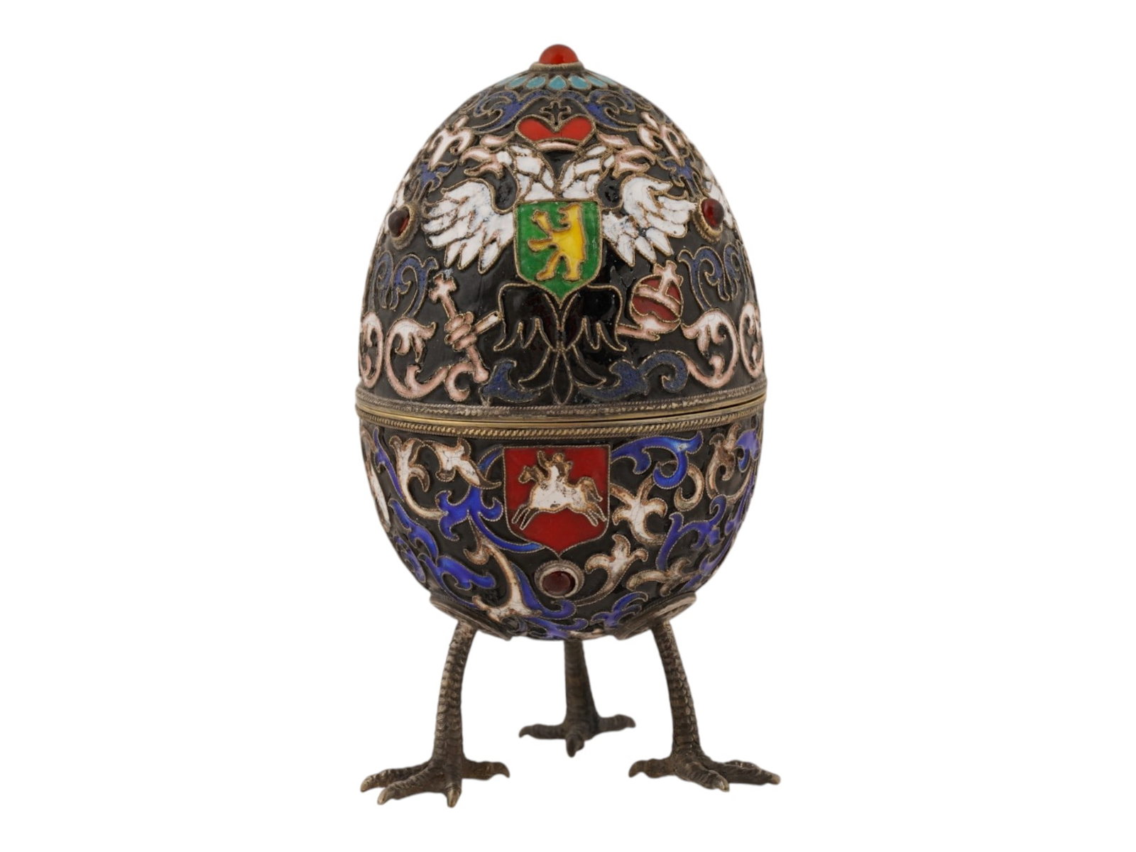 RUSSIAN SILVER ENAMEL EASTER EGG W RUBIES GEMSTONES: A Russian silver enamel Easter egg consisting of two parts. Decorated with rubies, gemstones and enameled in the cloisonne technique throughout the body featuring the Russian Imperial Warrants. Gold