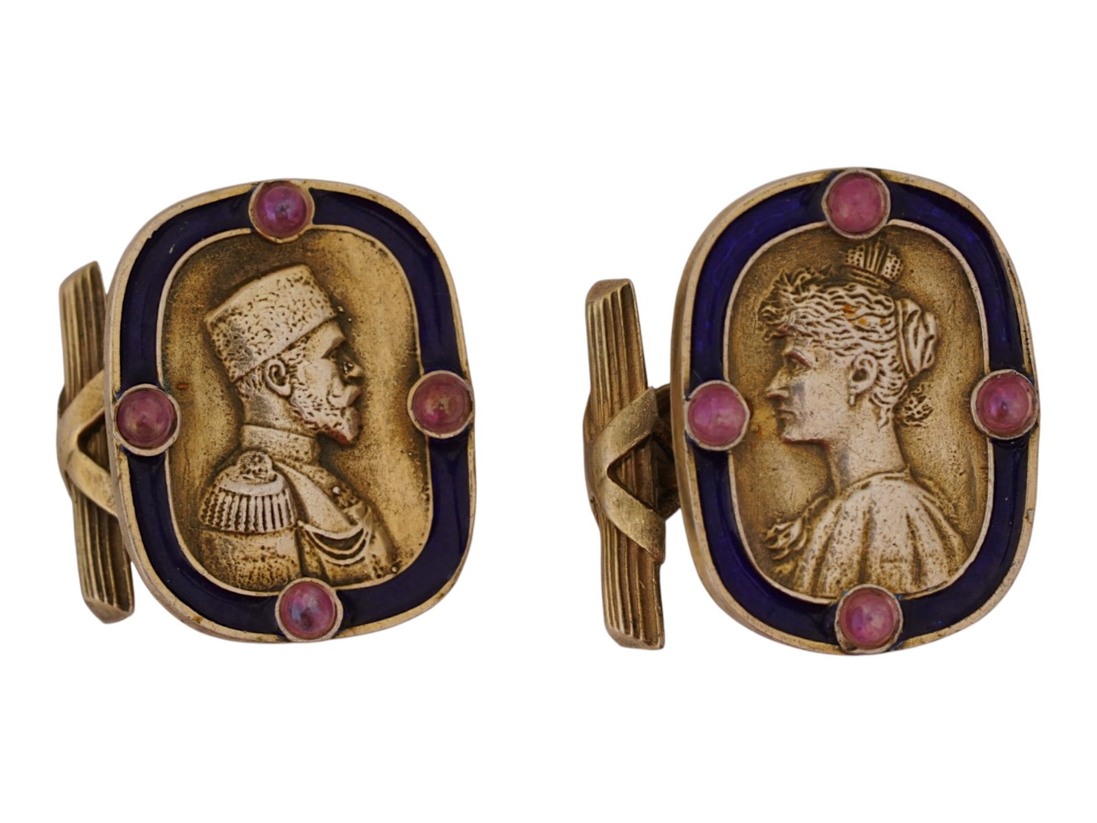RUSSIAN IMPERIAL GILT SILVER CUFFLINKS WITH GEMSTONES: A pair of Russian Imperial presentation gilt silver chain-style cufflinks. The front parts represent the profile portraits of the last Emperor Nicholas II and his wife Alexandra Feodorovna. Cobalt