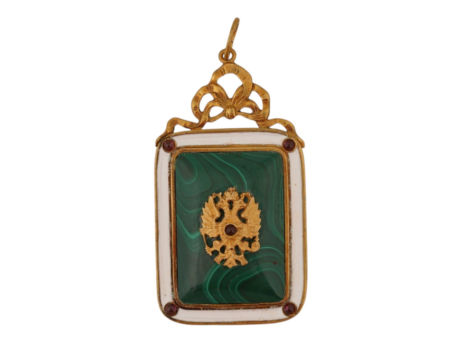 RUSSIAN SILVER ENAMEL MALACHITE IMPERIAL PENDANT W GEMS: A Russian gilt silver pendant. A rectangular medallion with a central overlay double-headed eagle on polished malachite stone. The white enameled rims are garnished with gemstone cabochons.