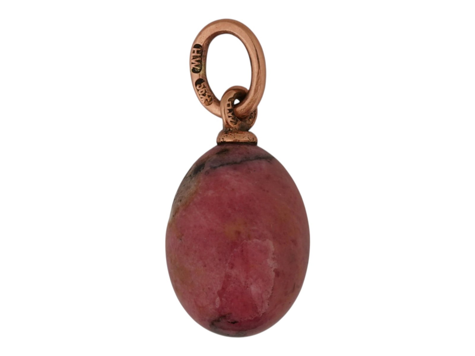 RUSSIAN GOLD AND CARVED RHODONITE EASTER EGG PENDANT: A Russian miniature Easter egg pendant hand-carved from rhodonite and mounted in gold. The pendant showcases the stones distinctive rose-pink coloration with natural dark veining. Hallmarked with 56