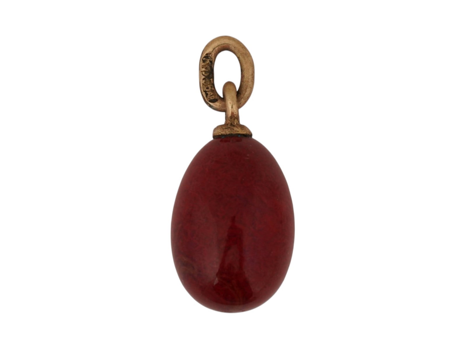 RUSSIAN 14K GOLD CARVED PURPURINE EASTER EGG PENDANT: A Russian 14K Gold mounted and carved Purpurine Easter egg pendant. Marked on the fitting ring with a 56 Imperial Russian gold standard and the makers mark. Collectible Russian Silver And Gold
