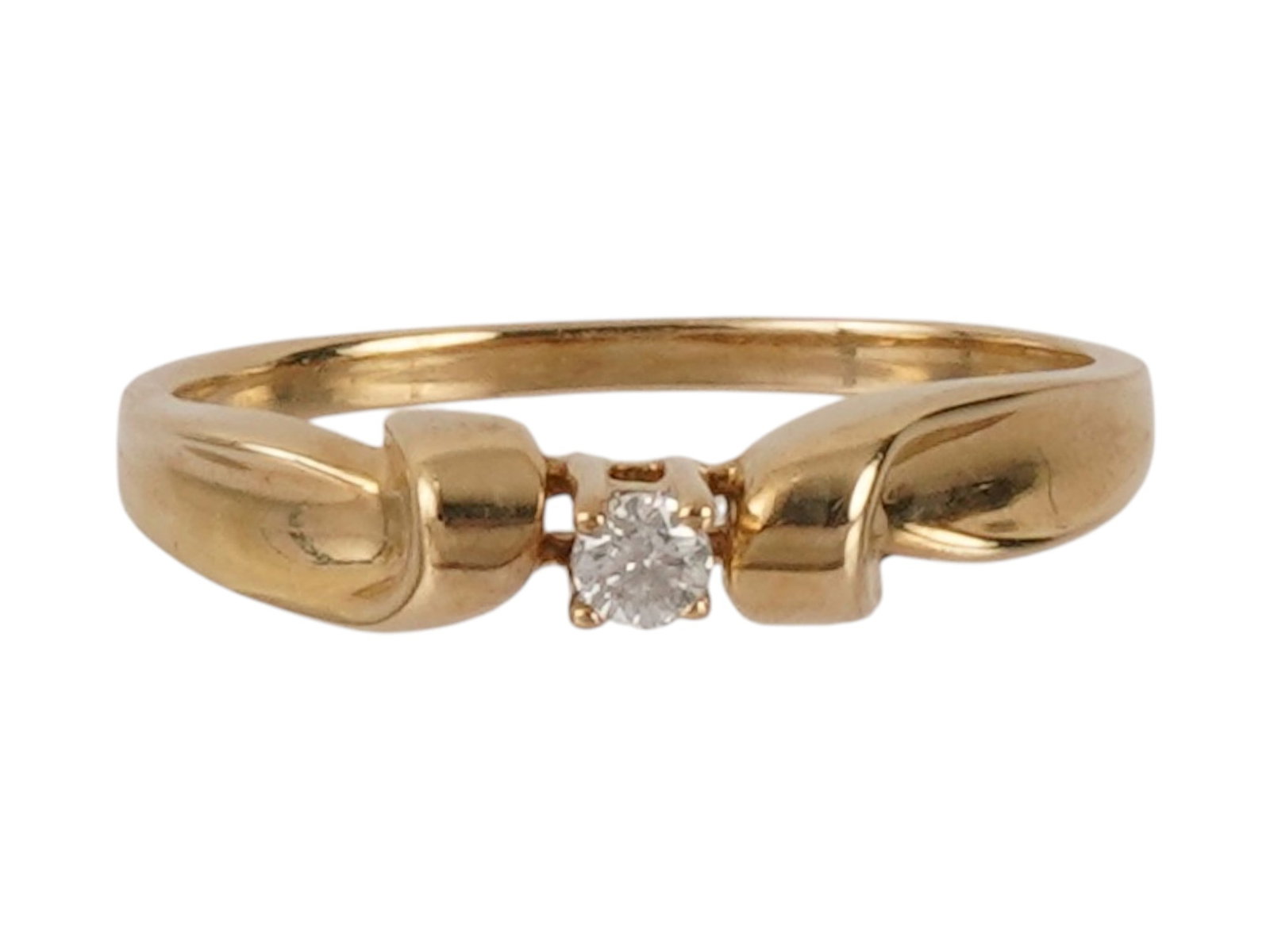 VINTAGE 10K GOLD DIAMOND ENGAGEMENT RING: A vintage 10K yellow gold engagement ring. Set with a round-cut diamond flanked by ribbon motifs. Marked on the inside. Total Weight: 1.91 g. Jewelry For Women, Statement And Wedding Rings. THIS LOT
