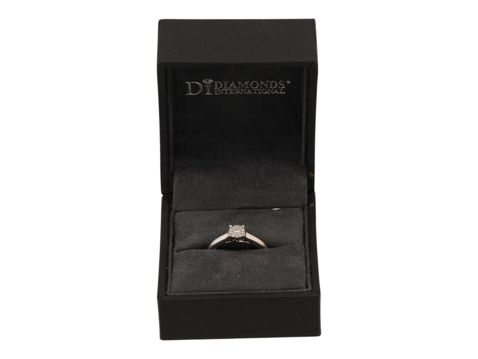 VINTAGE 14K WHITE GOLD RING WITH DIAMONDS: A vintage 14k white gold ring with diamonds. The ring features classic design with a central element at the top modeled in the shape of a flower. It is marked with 14K gold standard inside. Luxury