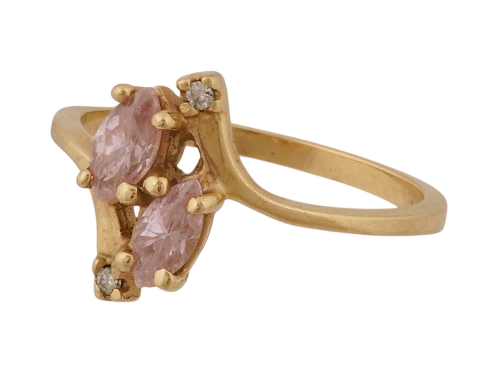 VINTAGE 10K YELLOW GOLD RING WITH PINK AMETHYSTS: A vintage 10K yellow gold ring with pink amethysts. The ring features a bypass-style setting centering two marquise-cut pink amethyst. The gemstones are secured by traditional prongs and are accented