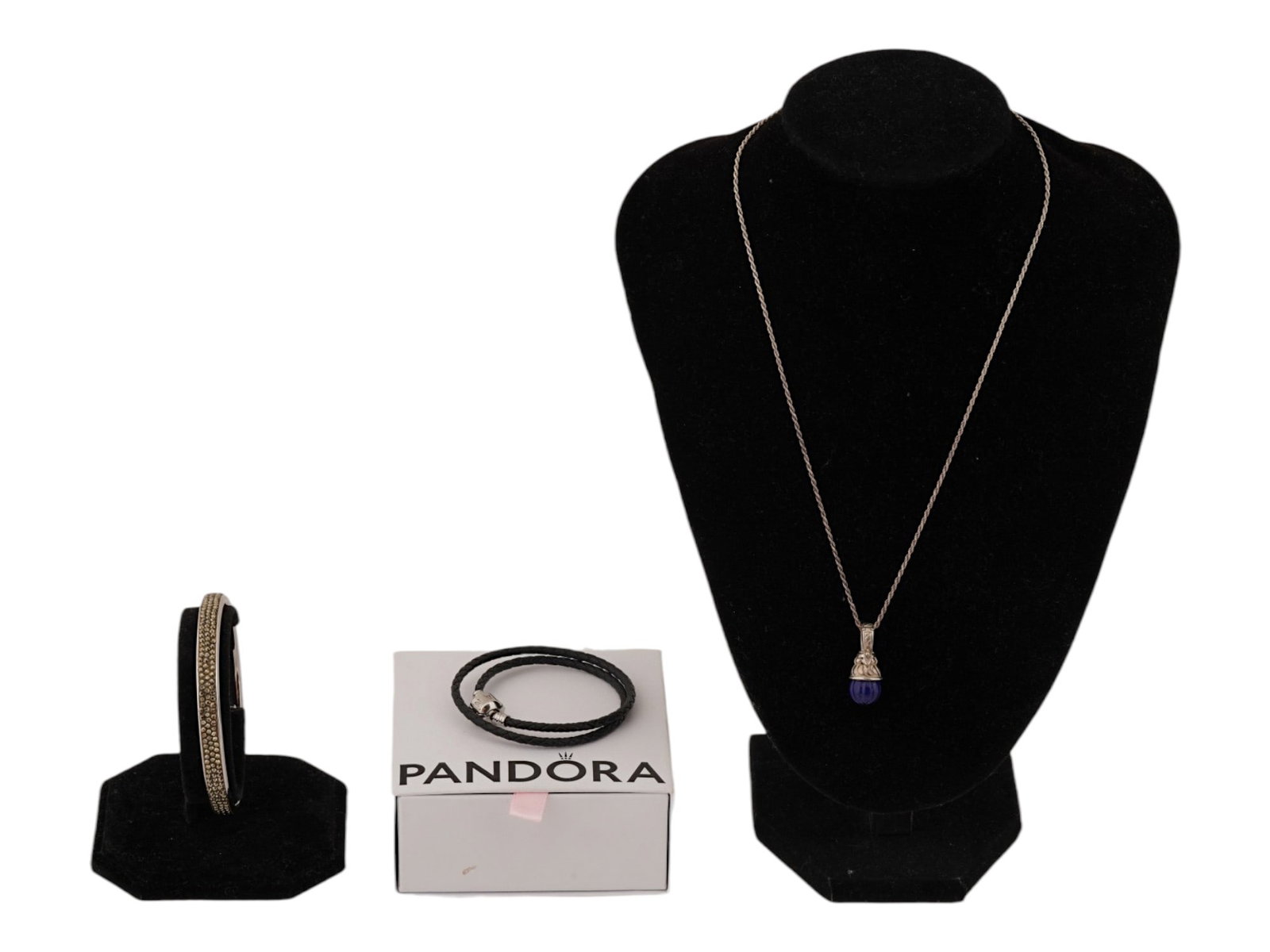 JUDITH LEIBER PANDORA BRACELETS NECKLACE W LAPIS LAZULI: A lot of three jewelry items, two bracelets and a pendant necklace. The lot contains an American Judith Leiber bangle bracelet adorned with a sparkling crystal pave. Marked on the inside. The Pandora