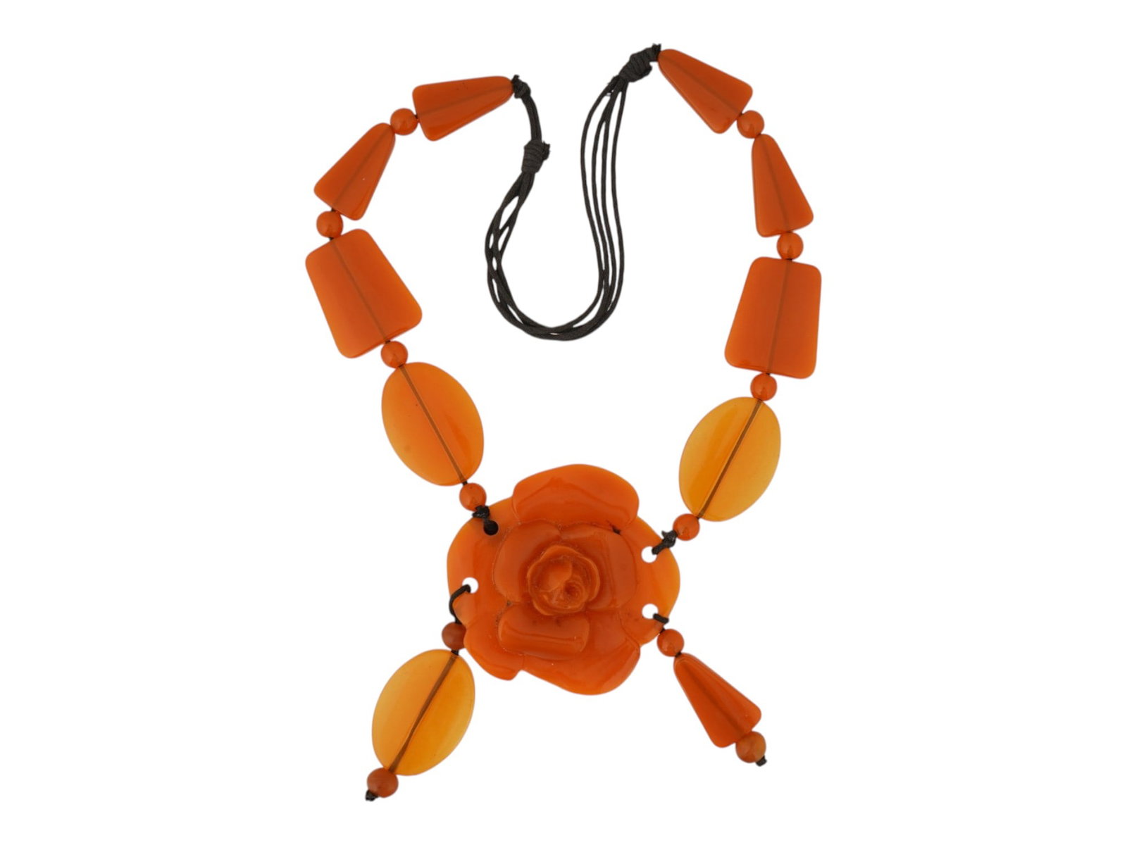 BEADED DESIGN BAKELITE NECKLACE W FLORAL PENDANT: A beaded bakelite necklace centers on a large, three dimensional carved rose pendant. The design incorporates a variety of bead shapes, including smooth ovals, flat rectangles, and fluted conical acce